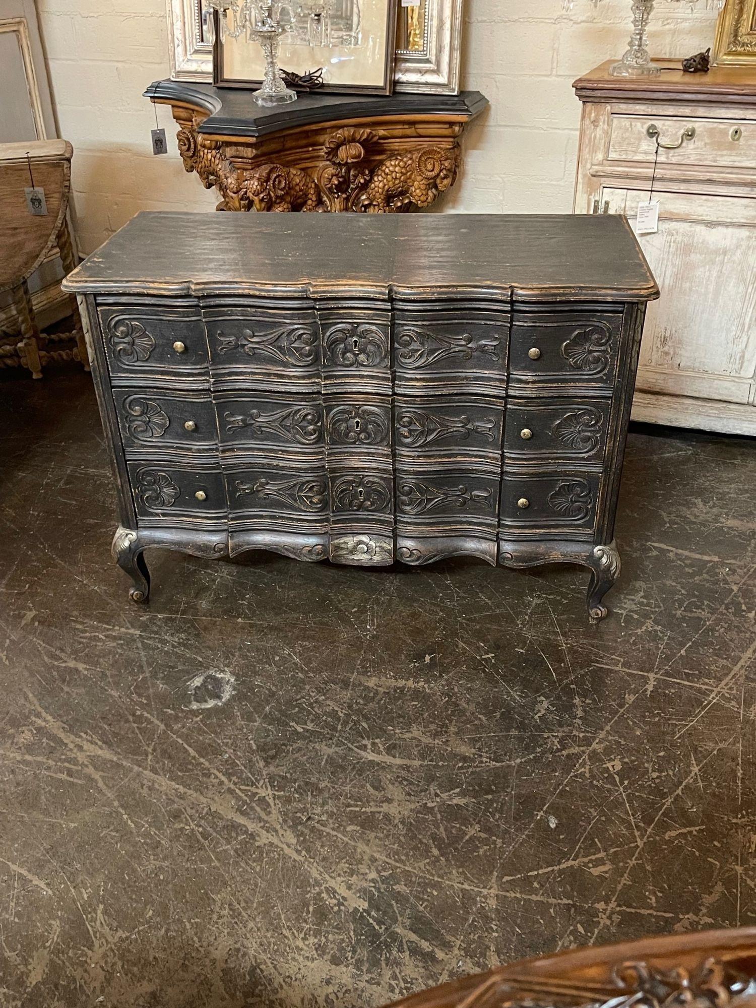 Handsome 19th century French carved and painted bedside chest. The piece has a pretty black colored patina and a curved shape on the front with beautiful carved. Very nice!!