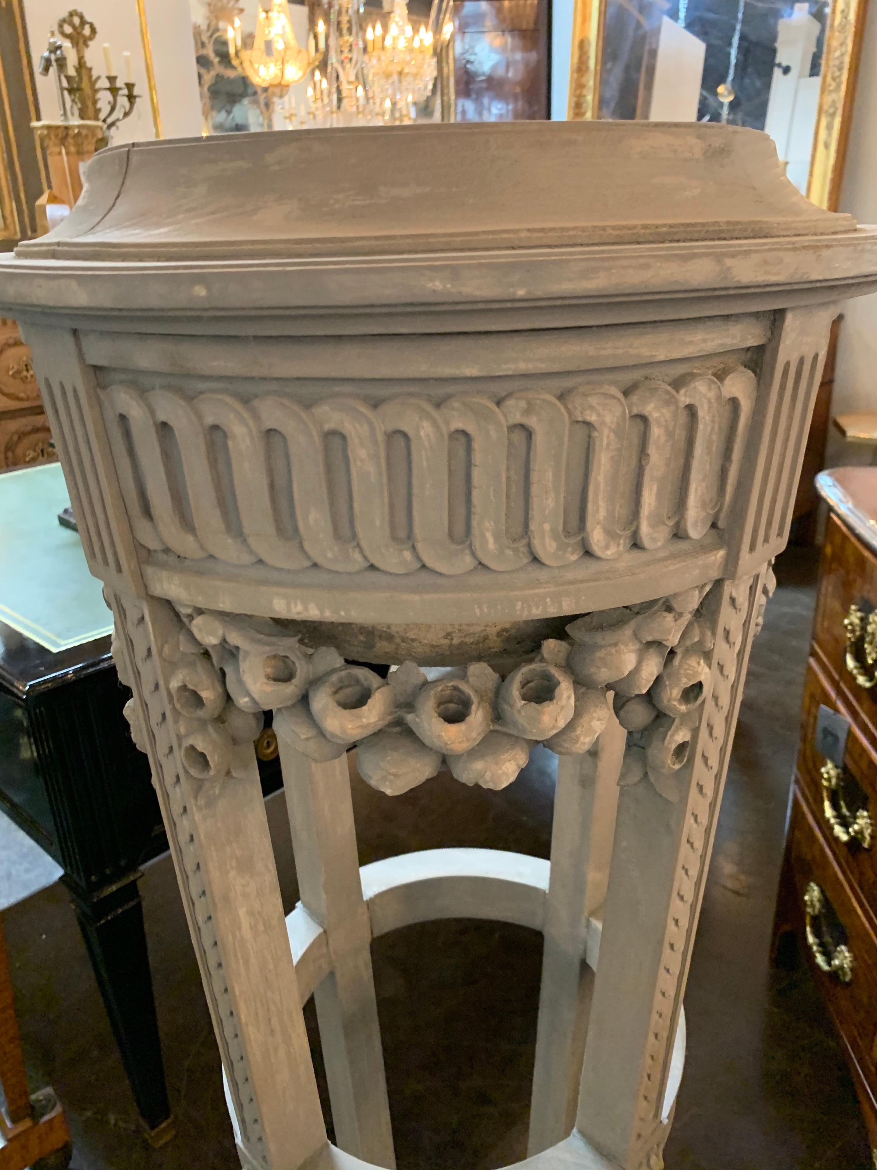 Beautifully carved French 19th century painted planter. The piece is painted with a grey colored wash. A lovely decorative item!