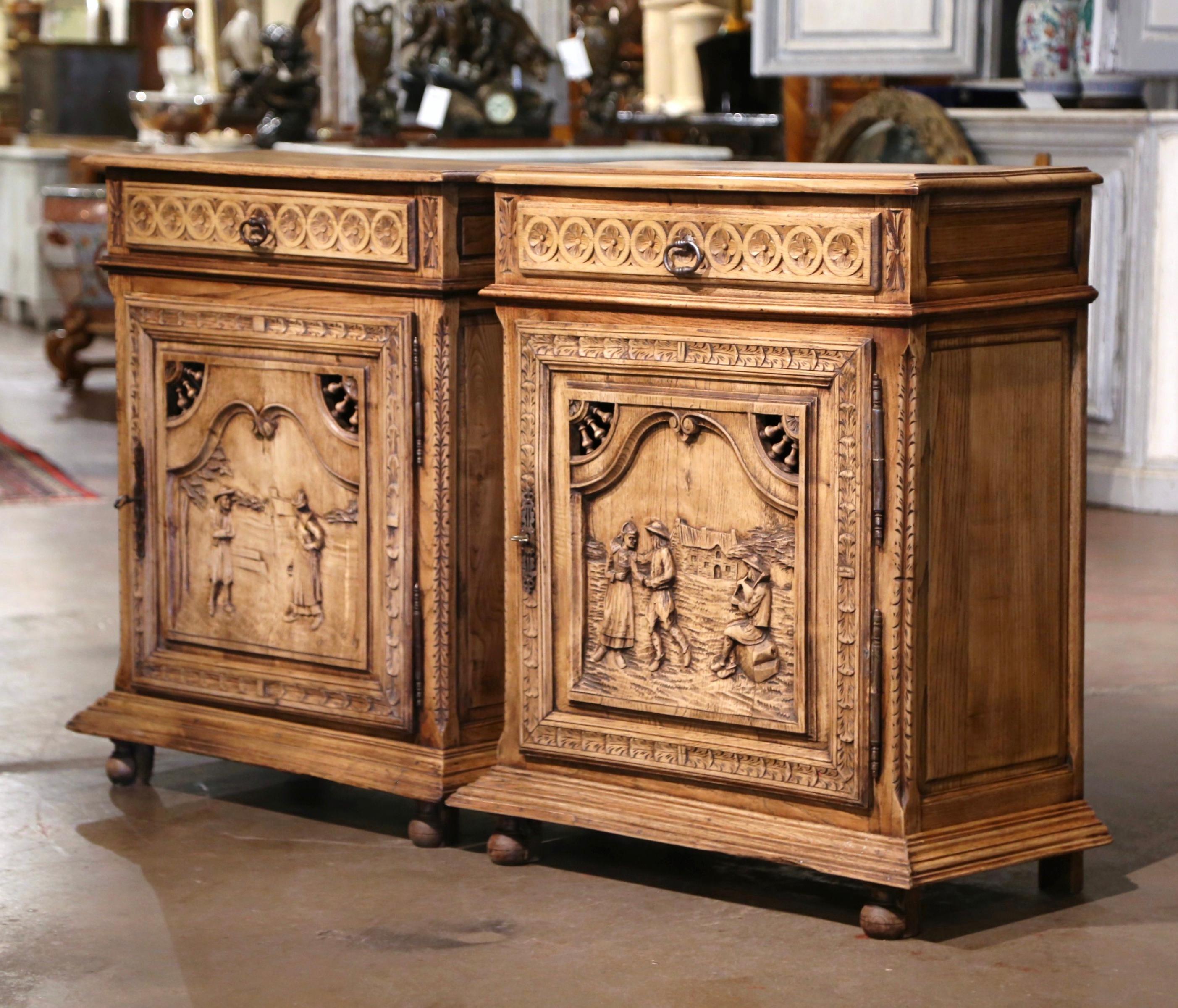 Decorate an entry way, a den or an office with these elegant antique jelly cabinets. Crafted in Brittany France, circa 1870, and built of oak and chestnut, the 