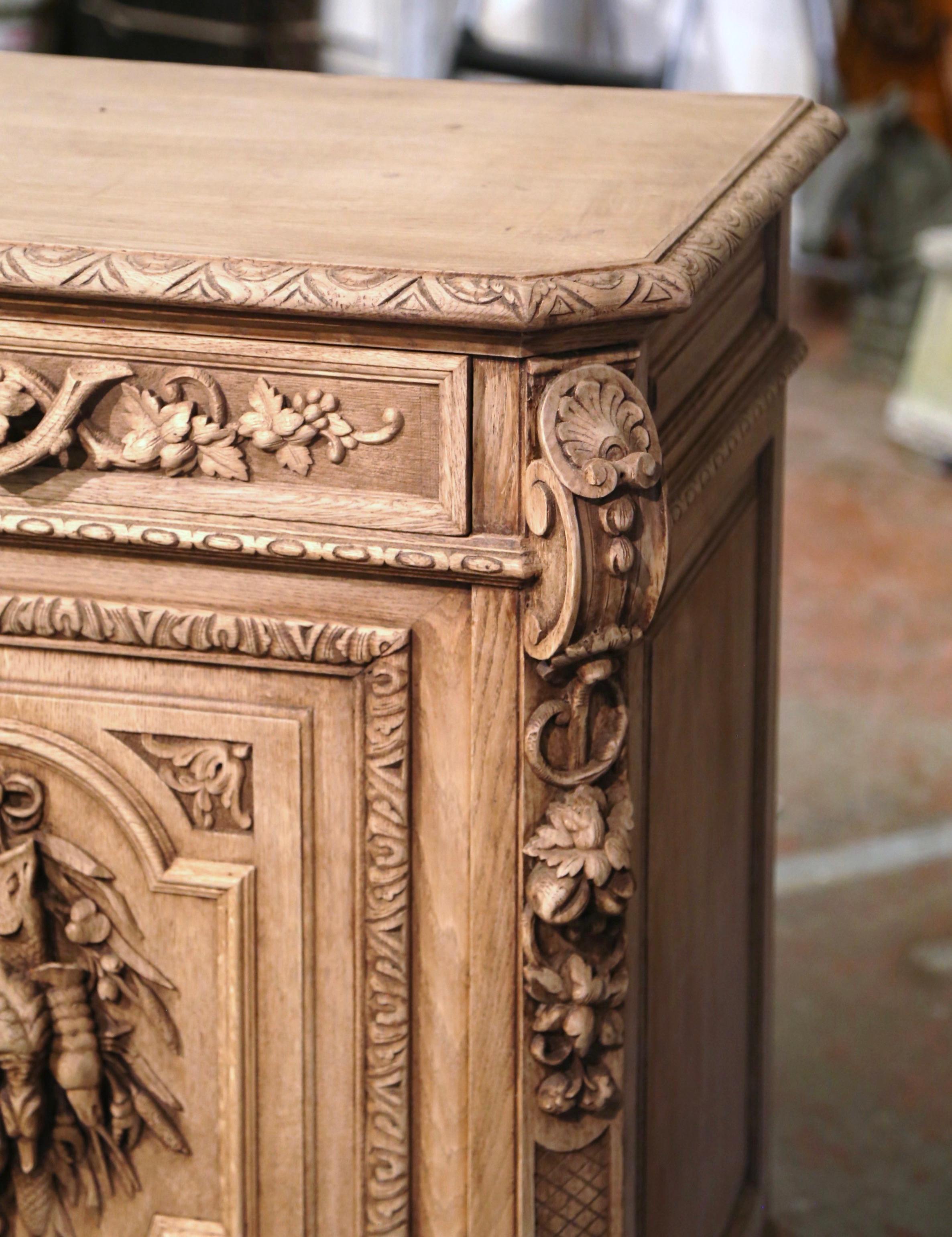 19th Century French Carved Bleached Oak Hunt Cabinet with Bird and Fish Motifs 7
