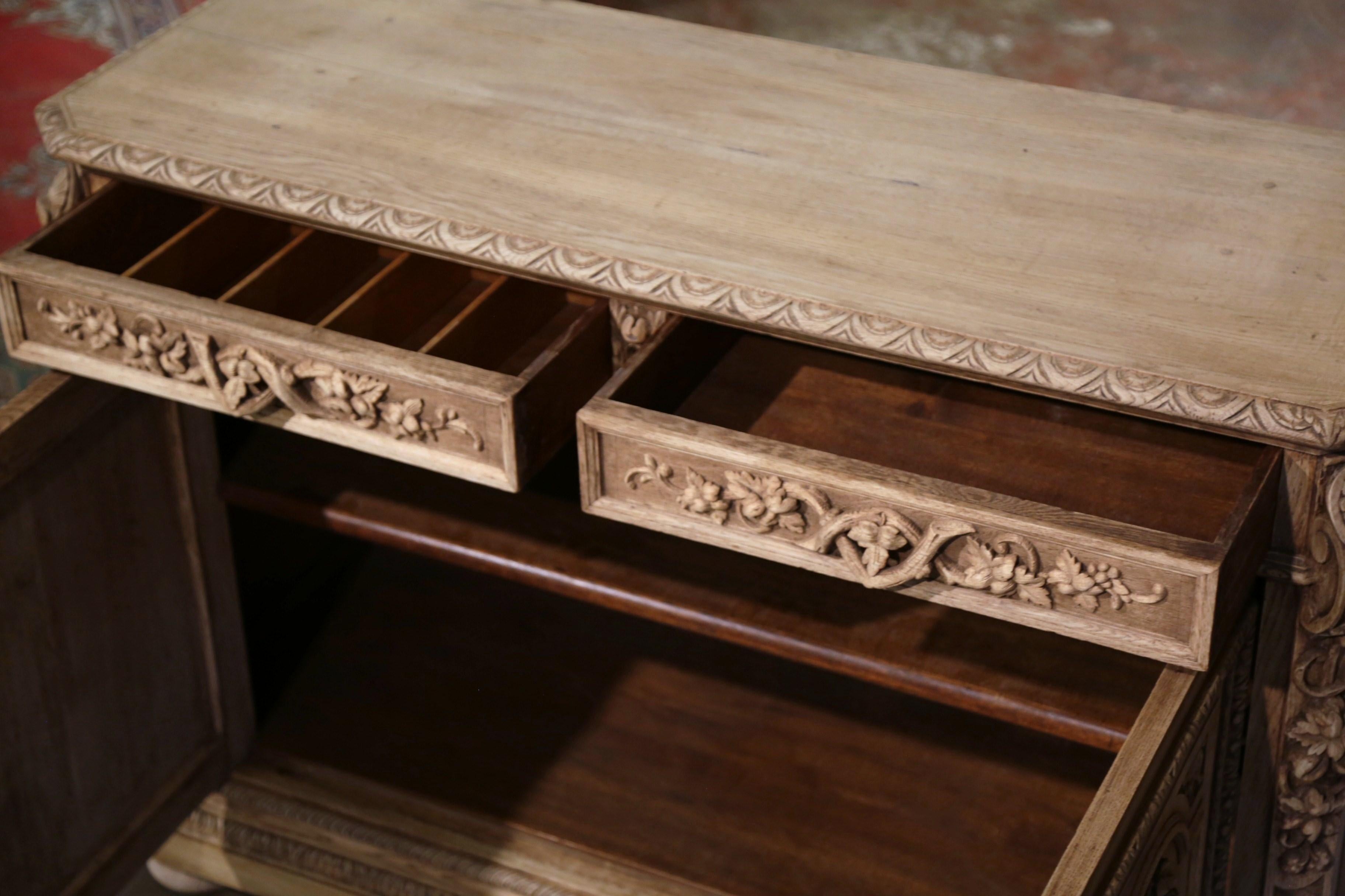 19th Century French Carved Bleached Oak Hunt Cabinet with Bird and Fish Motifs 10