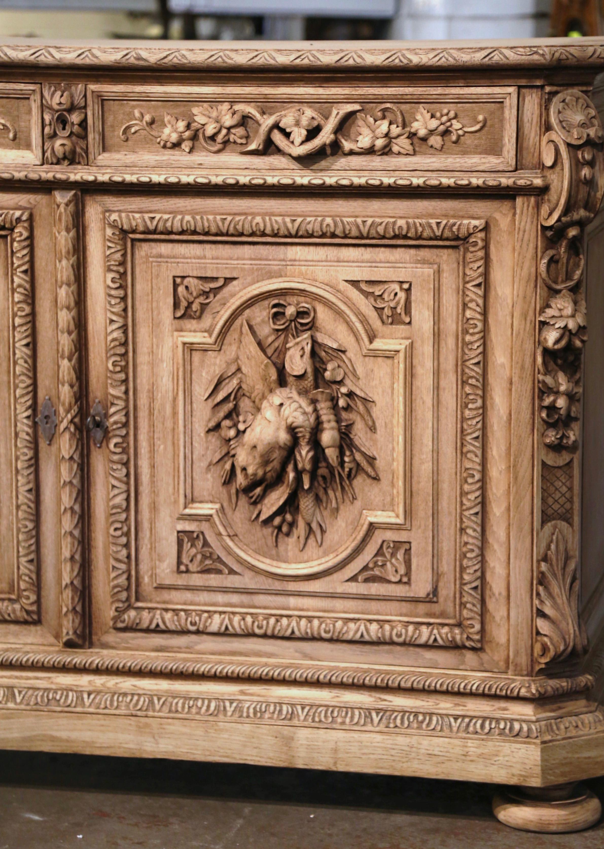 19th Century French Carved Bleached Oak Hunt Cabinet with Bird and Fish Motifs 2
