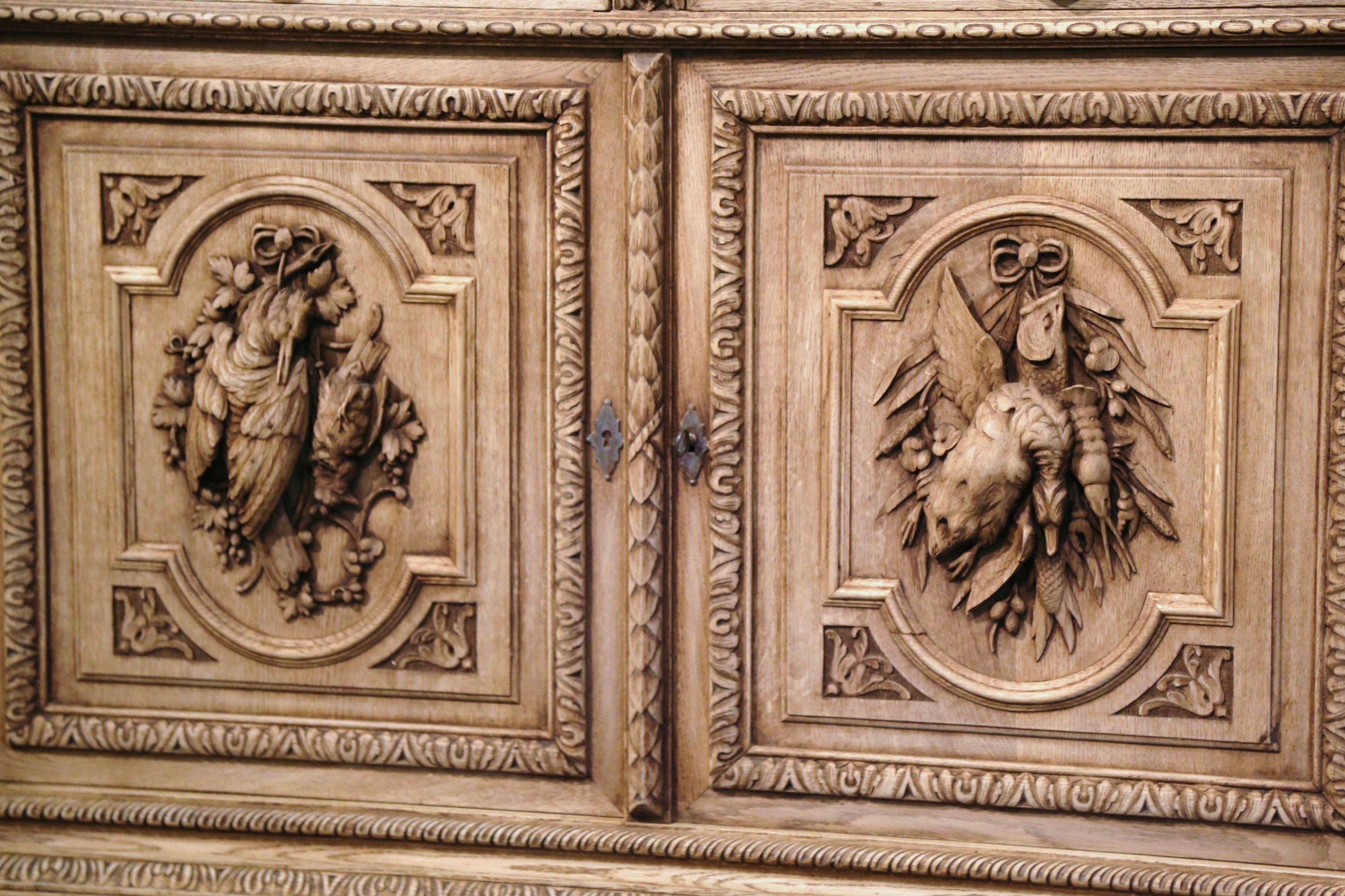 19th Century French Carved Bleached Oak Hunt Cabinet with Bird and Fish Motifs 4