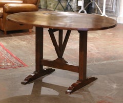 19th Century French Carved Cherry Tilt-Top Wine Tasting Table from Burgundy