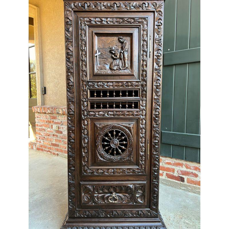 Hand-Carved 19th century French Carved Chestnut Bonnetiere Armoire Cabinet Brittany Breton