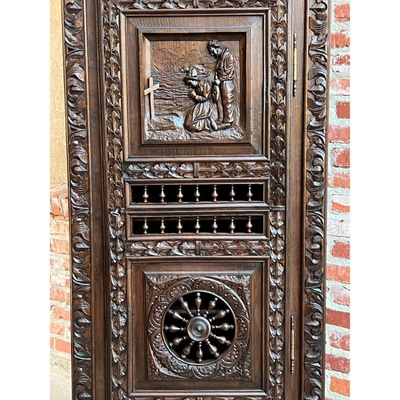 19th century French Carved Chestnut Bonnetiere Armoire Cabinet Brittany Breton In Good Condition In Shreveport, LA