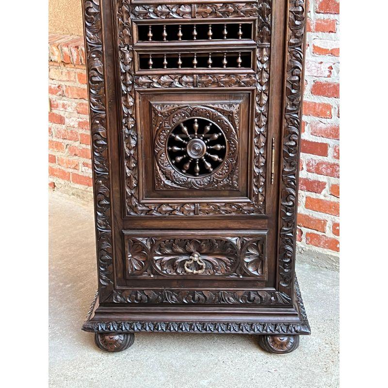 19th Century 19th century French Carved Chestnut Bonnetiere Armoire Cabinet Brittany Breton