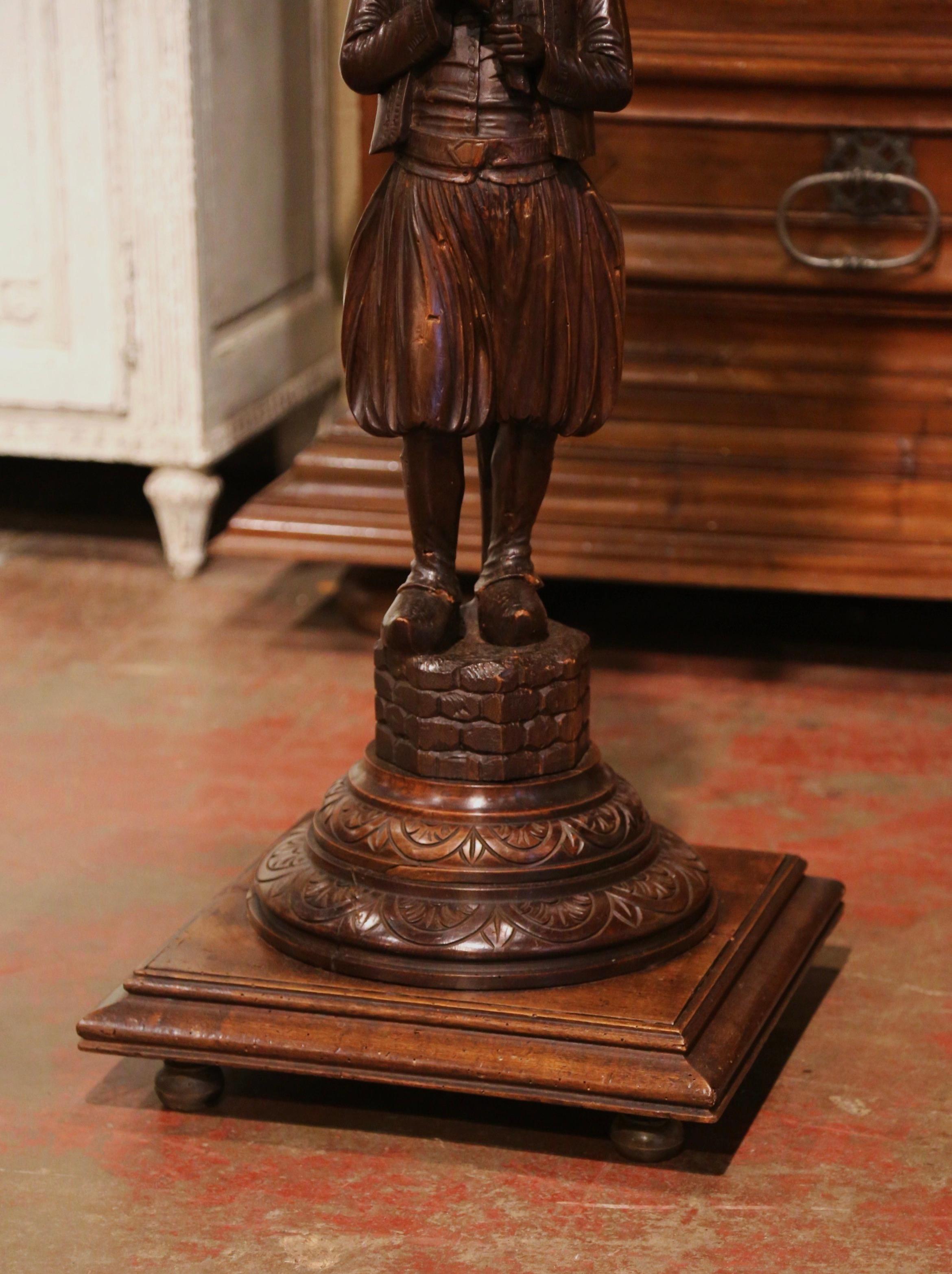 Country 19th Century French Carved Chestnut Pedestal Table with Breton Man Figure