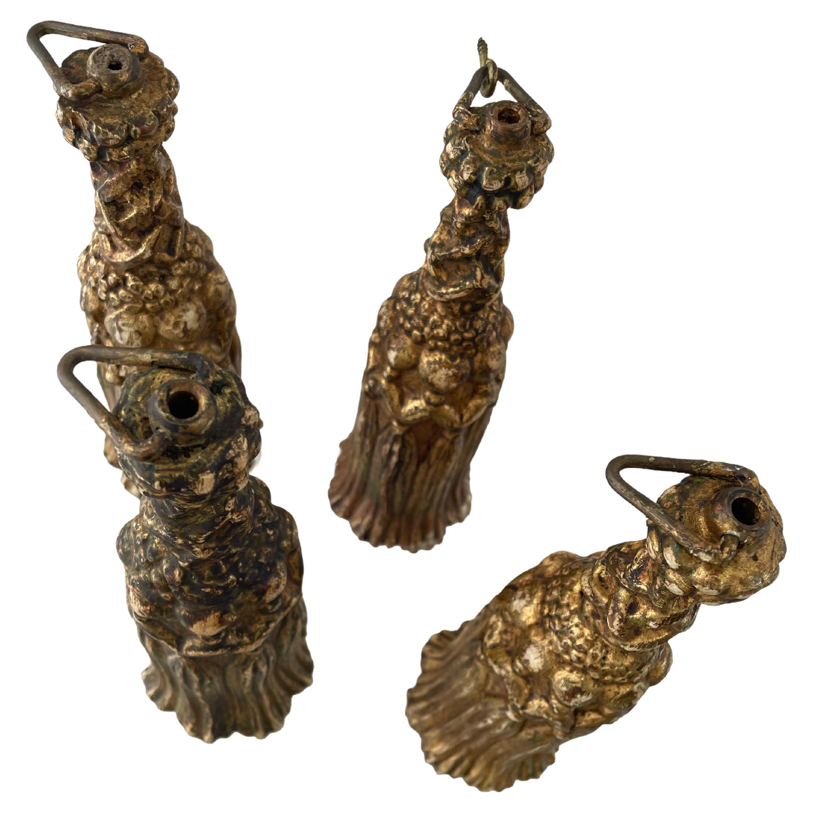 The meticulous craftsmanship of these hand carved gilded wood drapery tassels is superb. From the forged metal pulls on top to the intricately carved body, these gilt tassels are visually stunning and functional. They are – as they were in the past