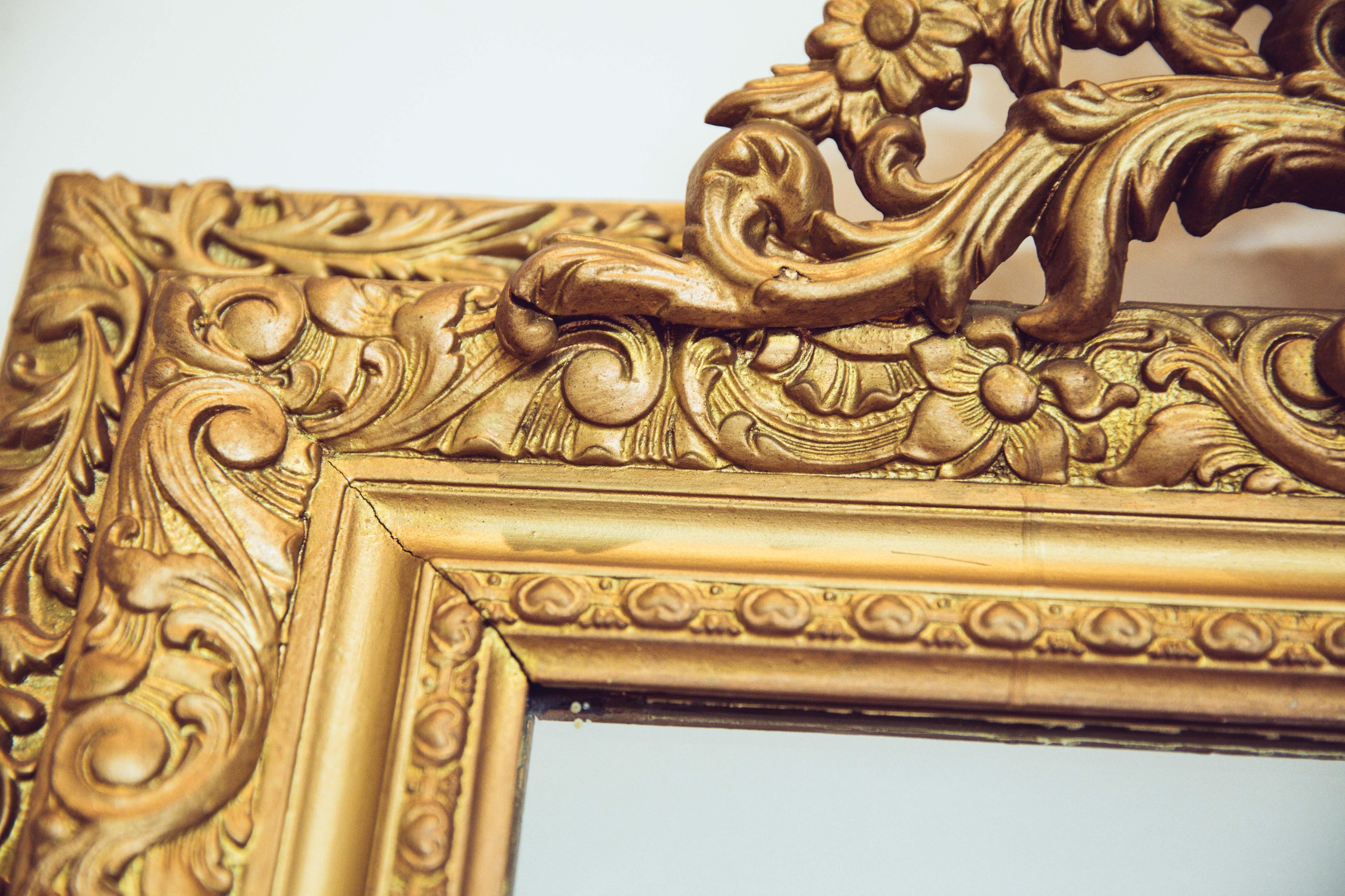 Late 19th Century 19th Century French Carved Gilded Wood Mirror with Urn Motif Crest For Sale