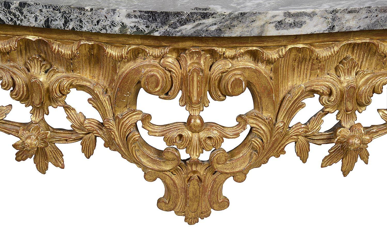 A good quality 19th Century French marble topped, carved giltwood console table.