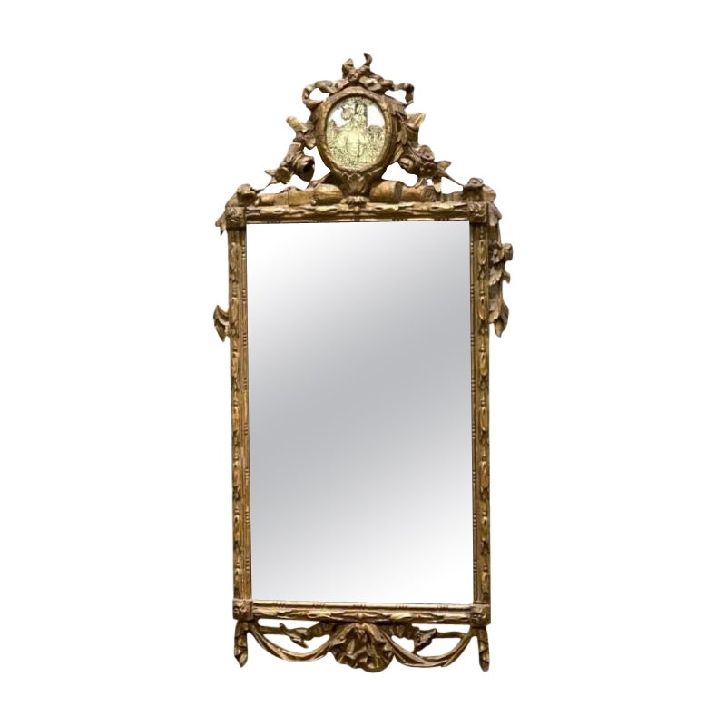 Espejo Francés del Siglo XIX de Madera Dorada Tallada con Decoración de Verre Églomisé en venta