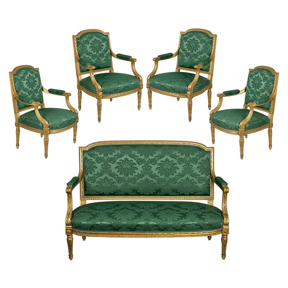 19th Century French Carved Giltwood Salon Suite with Settee and 4 Armchairs