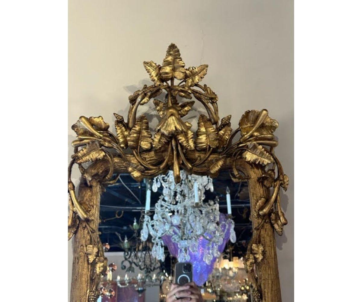 Exceptional 19th century French carved giltwood tree form mirror. Fabulous patina and the carvings are truly spectacular. Lovely!!