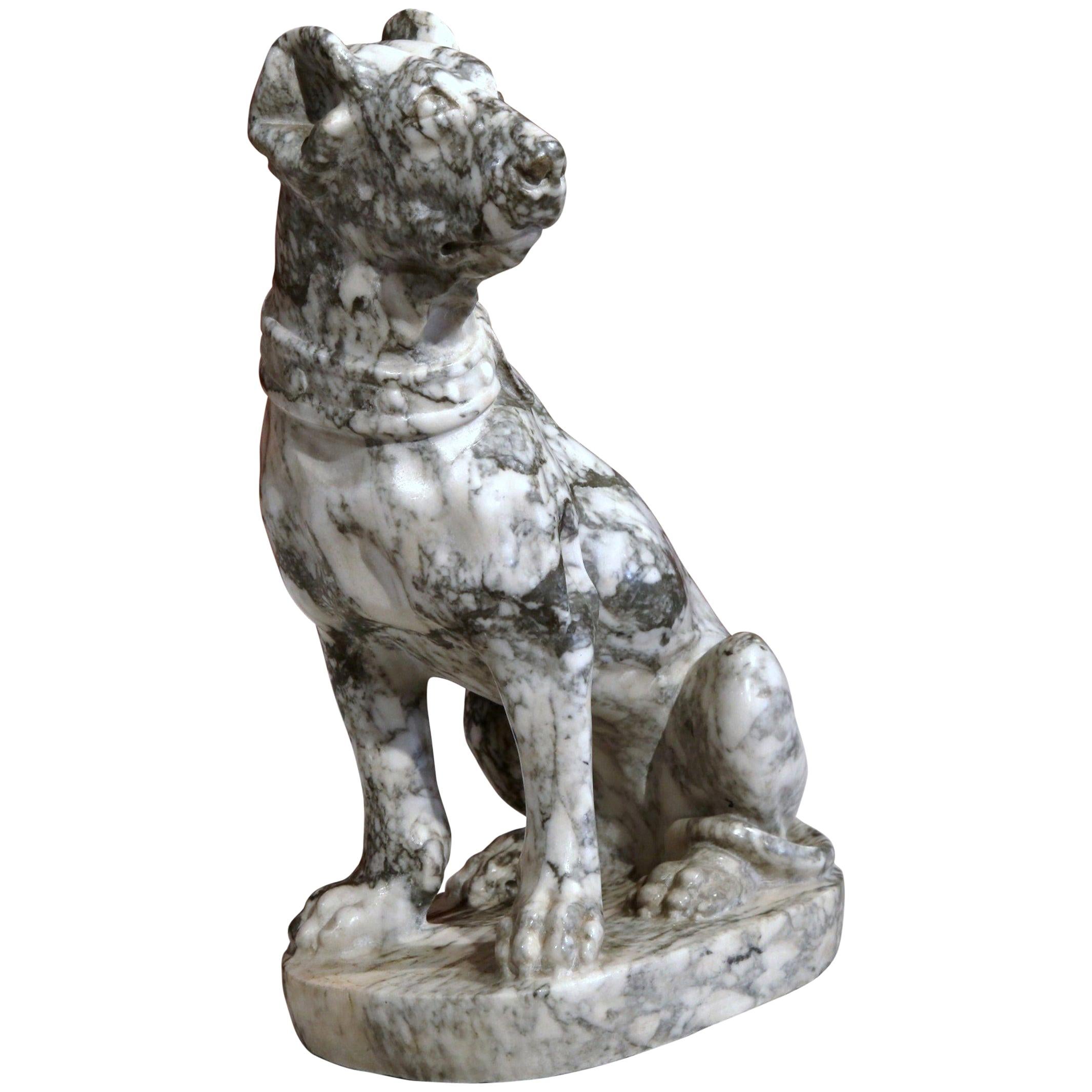 This elegant antique marble dog figure was crafted in France, circa 1870, the animal sculpture in a seated position on an oval base, features a carved collar around the neck. Excellent condition with intricate detail work, wonderful proportions and