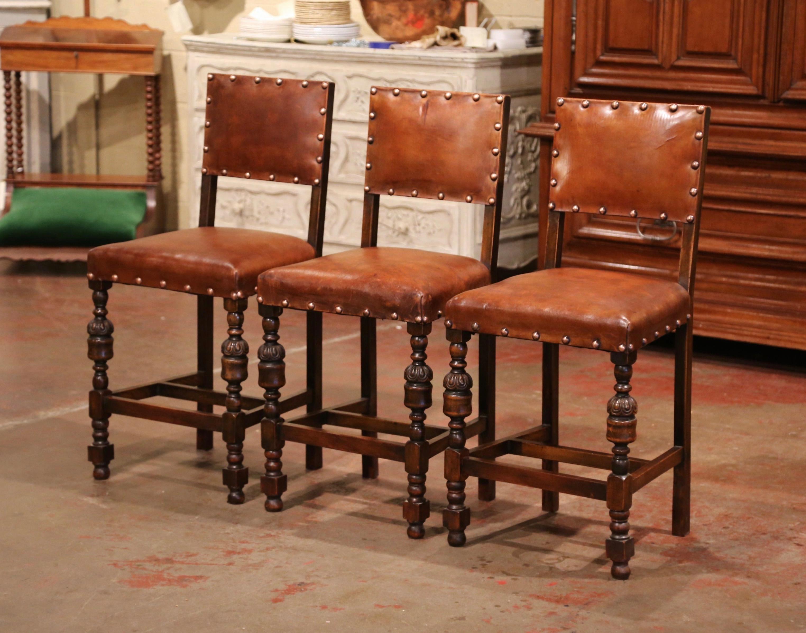 Louis XIII 19th Century French Carved Oak and Brown Leather Bar Stools, Set of Three