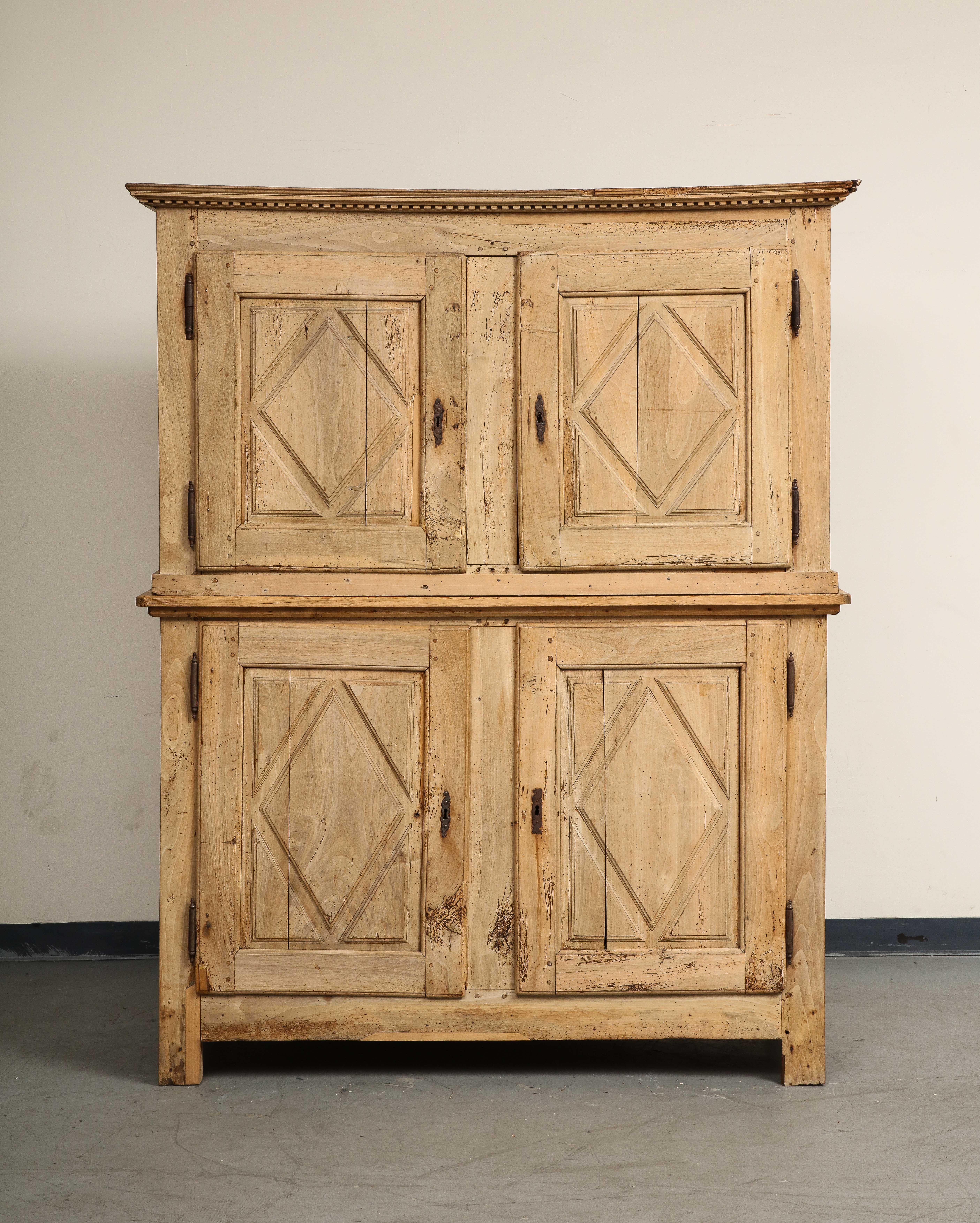 19th century French carved oak armoire with TV mount in upper portion. Diamond design on all four cabinet doors and side panels. Original hardware. 

Additional dimensions 
Top 35