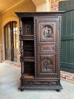 19th century French Carved Oak Bonnetiere Armoire Linen Cabinet Brittany Breton