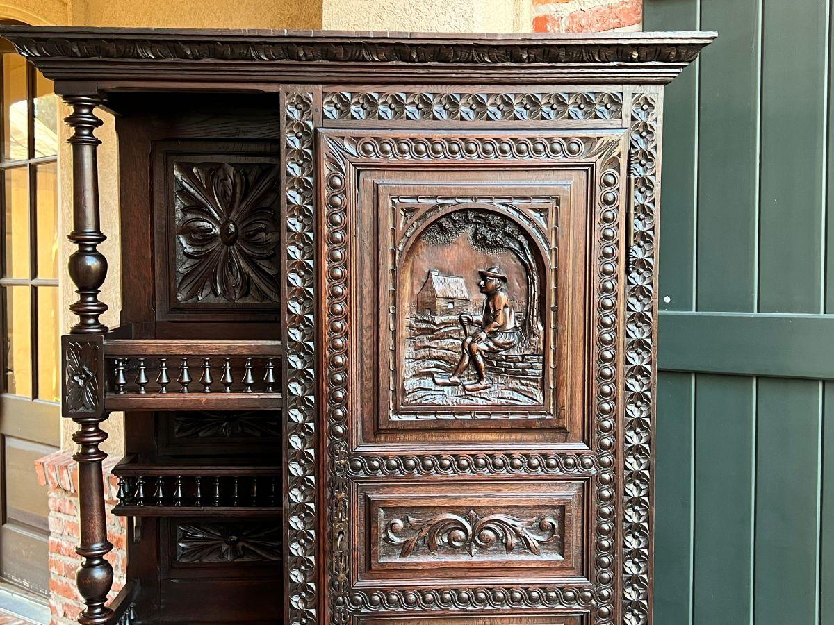 19th century French Carved Oak Bonnetiere Armoire Linen Cabinet Brittany Breton In Good Condition In Shreveport, LA