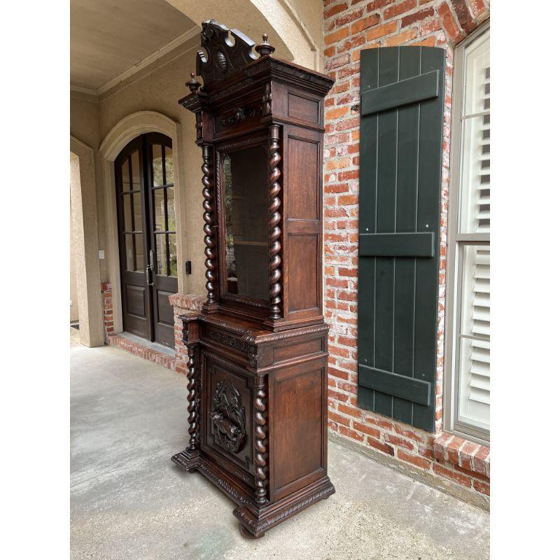 Late 19th Century 19th century French Carved Oak Bookcase Hunt Cabinet Barley Twist Black Forest