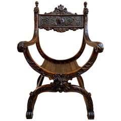 chaise curule en chêne sculpté du 19ème siècle Français Trône à bras Renaissance Dagobert