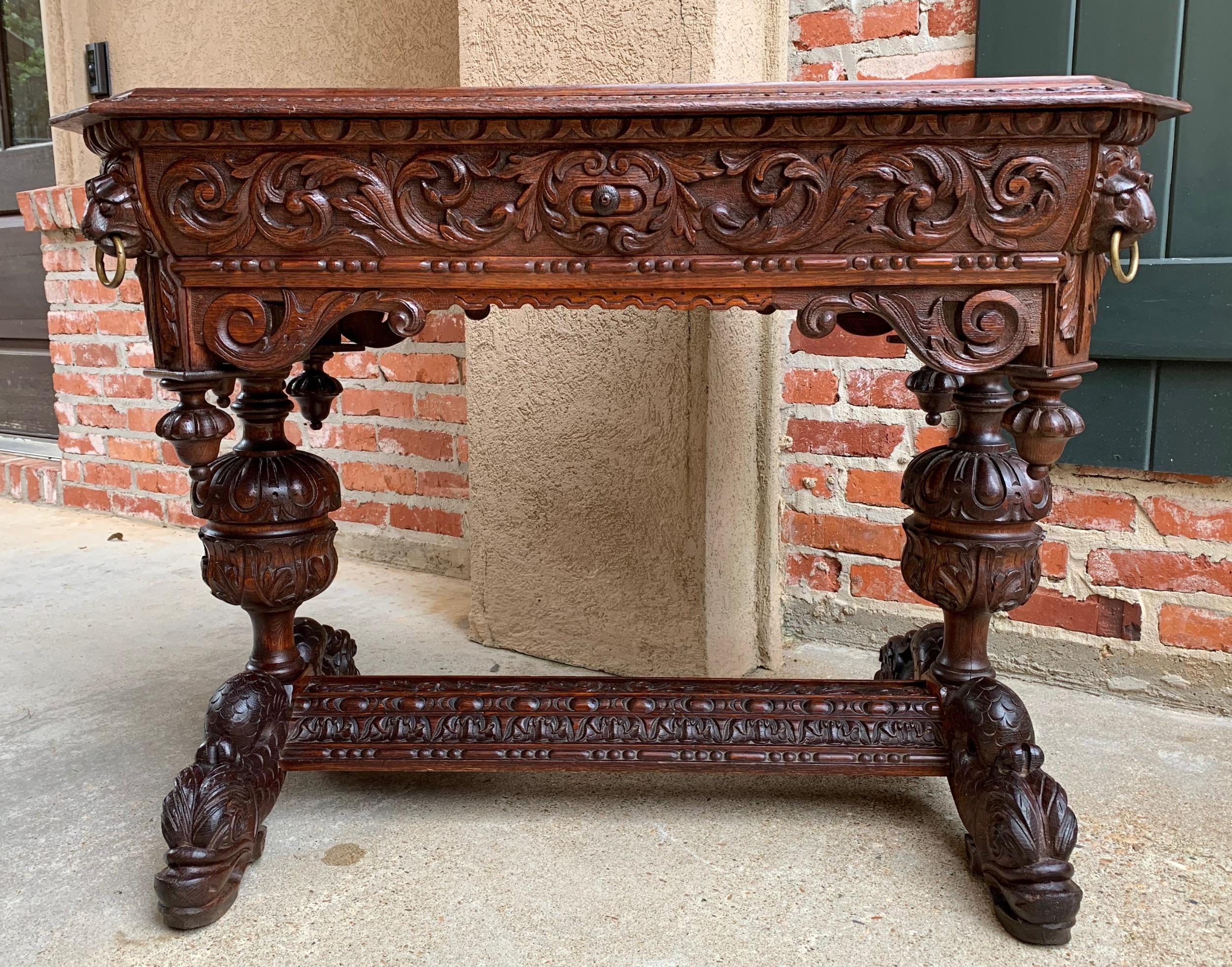 19th century antique French carved oak dolphin table desk Renaissance Gothic

~ Direct from France
An elegant antique French carved library table or 