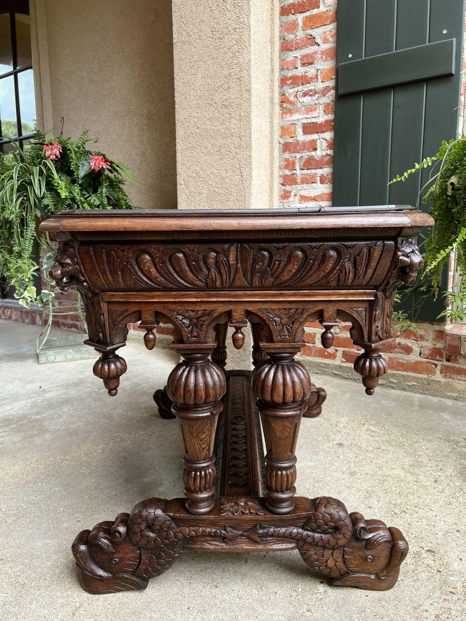 Hand-Carved 19th Century French Carved Oak Dolphin Library Table Desk Renaissance Gothic For Sale