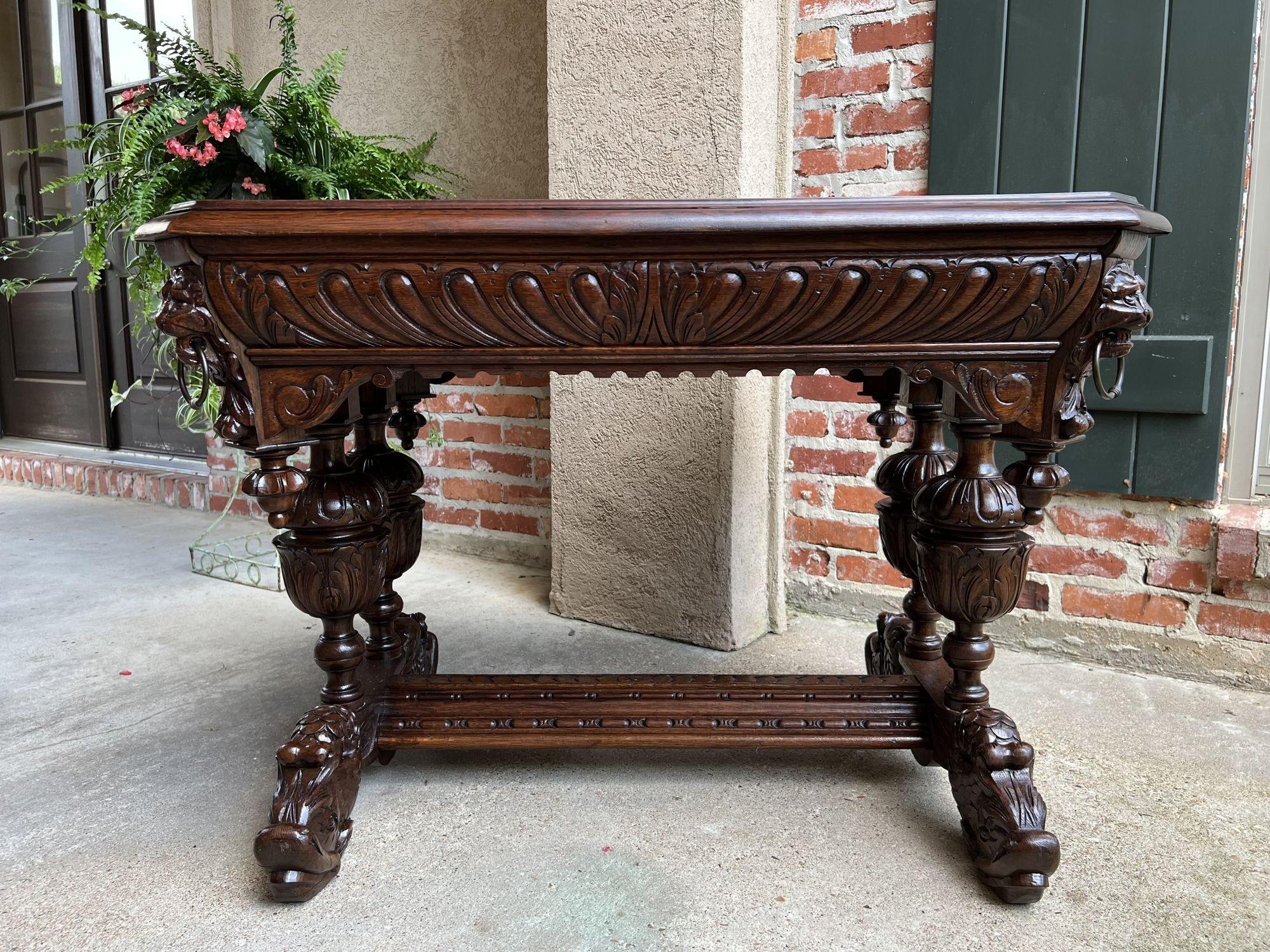 Late 19th Century 19th Century French Carved Oak Dolphin Library Table Desk Renaissance Gothic For Sale