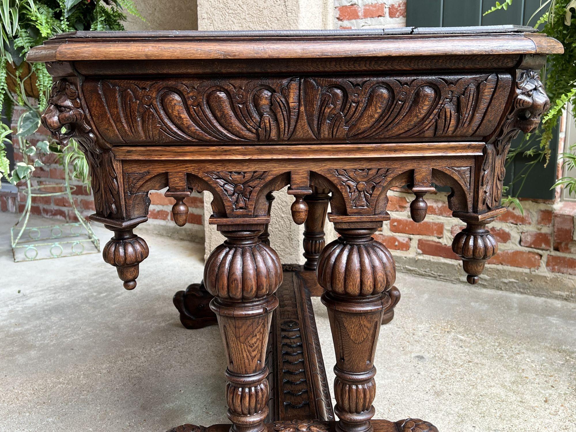 Late 19th Century 19th Century French Carved Oak Dolphin Library Table Desk Renaissance Gothic For Sale