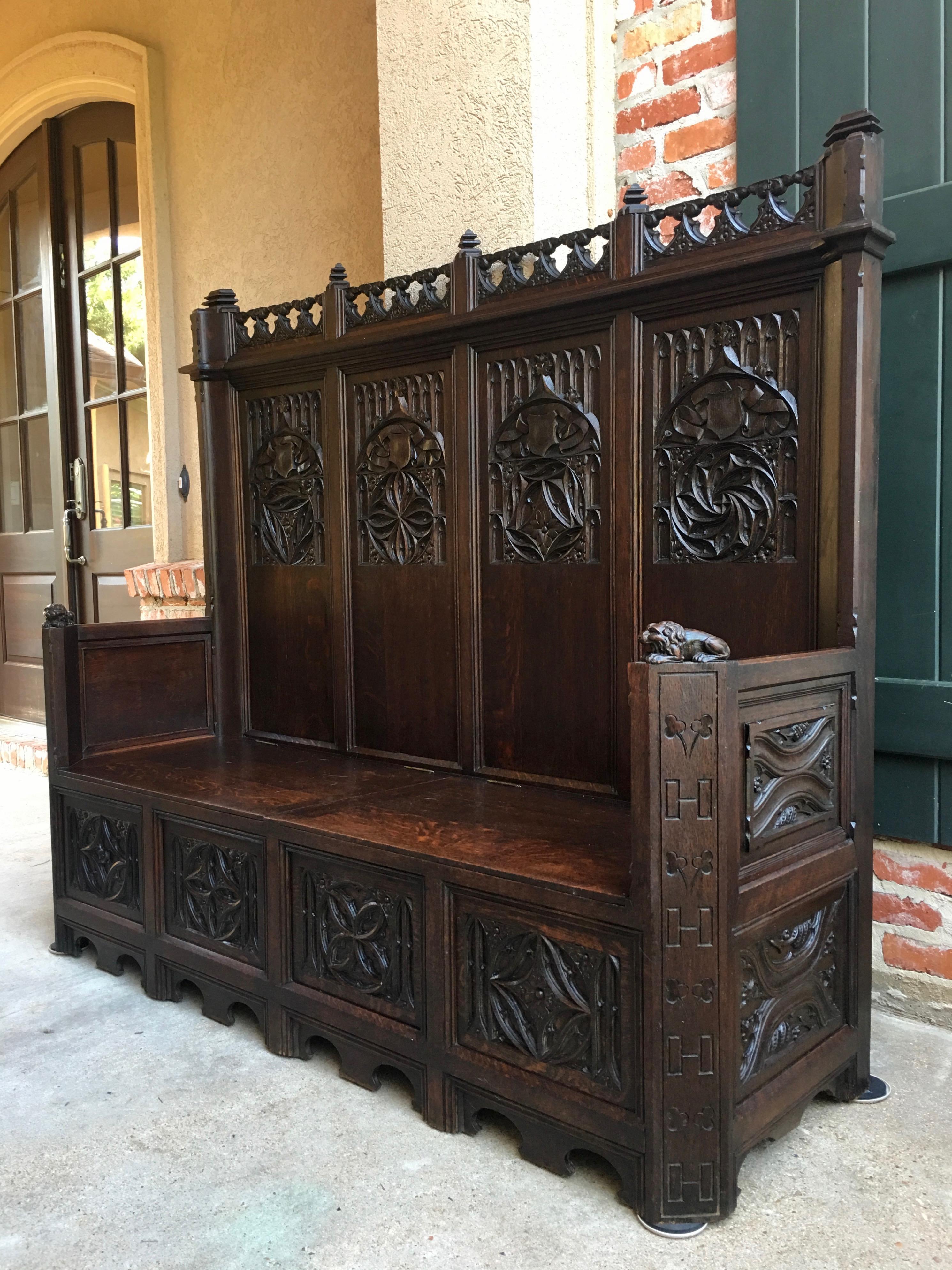 Direct from France, a beautifully carved antique French oak hall bench, in a large 5.5 ft. length, perfect for so many different areas of your home!~

~One of a kind, either originally commissioned for a public chapel or personal chapel for an