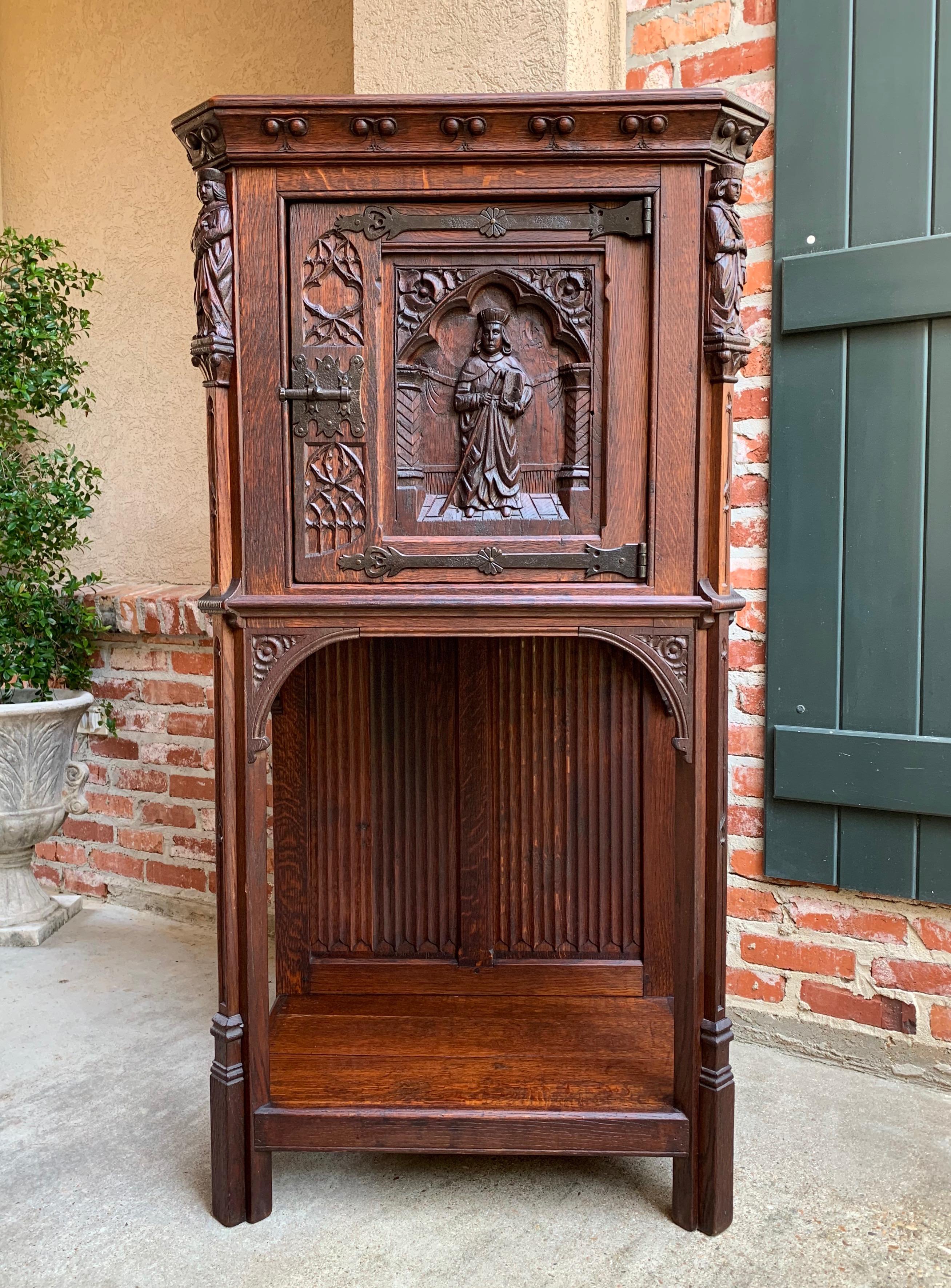 ~ Direct from France
~ Lovely antique French oak vestment/sacristy cabinet
~ Superb designs, look at the gorgeous dimensional carvings on the upper door front…a priest with his Bible in his hand (or depiction of Moses with scroll and staff)
~ And