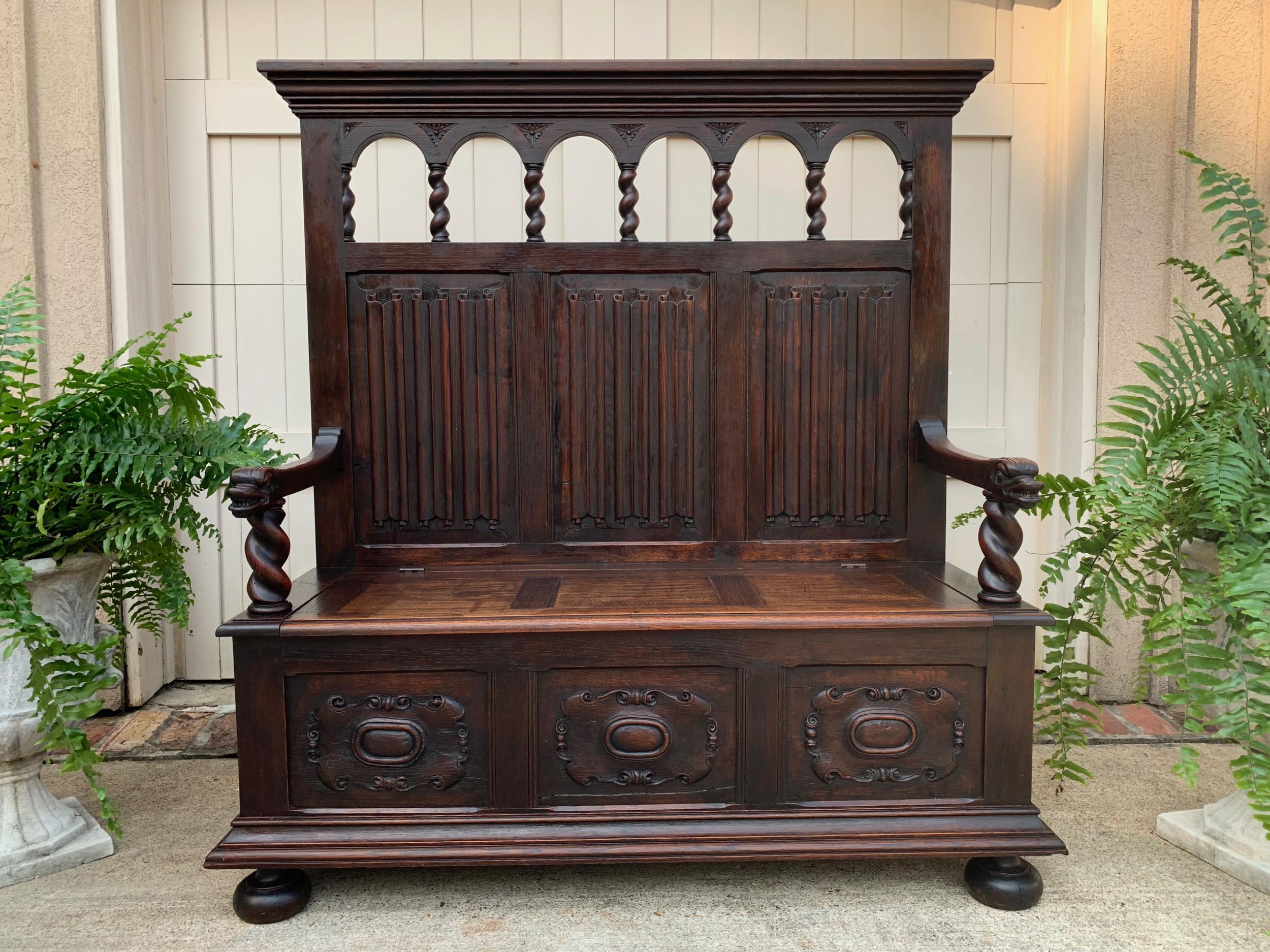 19th century antique French carved oak hall bench pew chest settle barley twist Renaissance

~Direct from France~
~Large antique French carved hall bench, with gorgeous carved features~
~Large moulding above the tall upper back panel with open