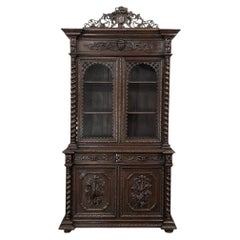 19th Century French Carved Oak Hunt Bookcase with Barley Twist Columns