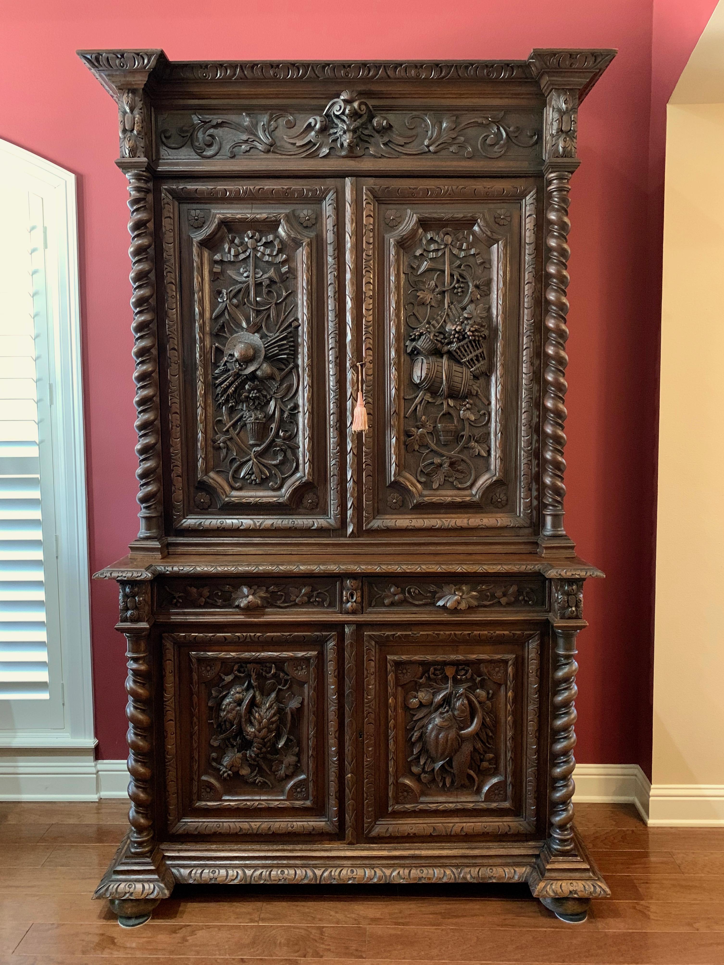 ~Direct from France~
~A gorgeous antique French bookcase cabinet, tall and majestic (almost 8. ft.) and covered with beautiful hand carvings!~
~High upper crown features carved, stepped out moulding above a wide carved band with dimensional carved