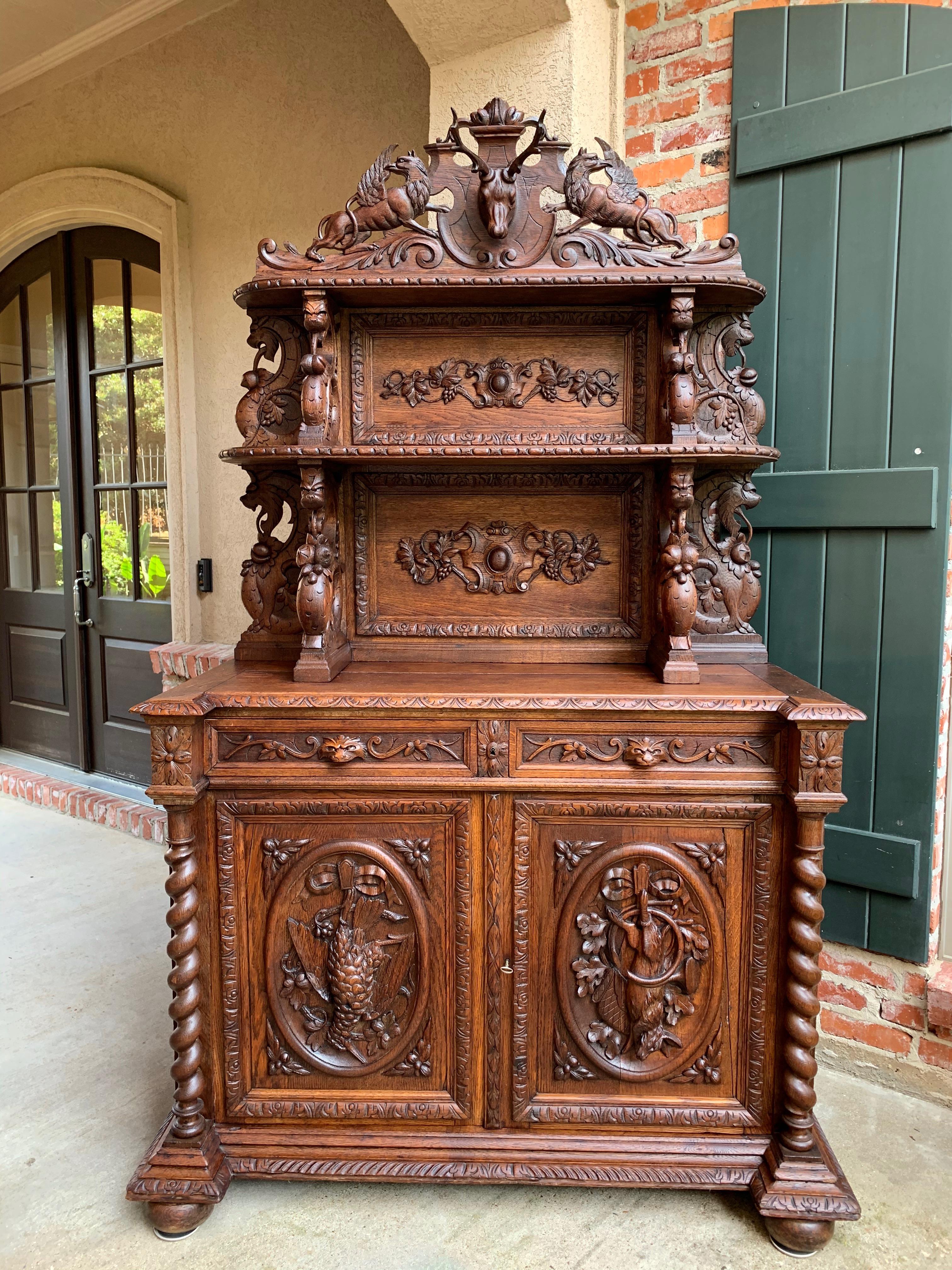 ~Direct from France~
~This hand carved cabinet is one of those antiques that really just cause you to step back for a minute and study the details…the amazing details that were hand carved in the natural light, long before electricity and