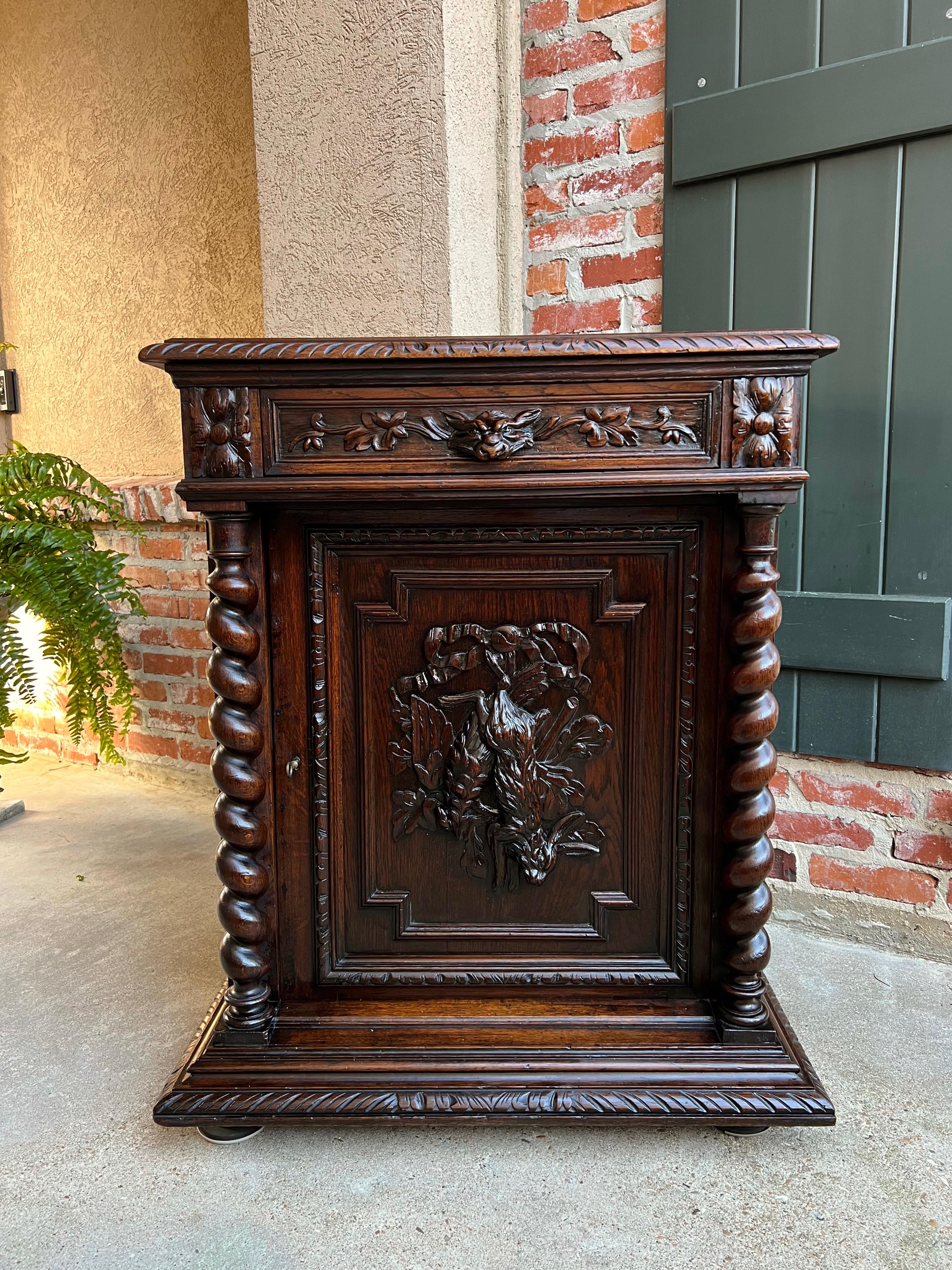 French Provincial 19th century French Carved Oak Hunt Cabinet Confiturier Barley Twist Rabbit