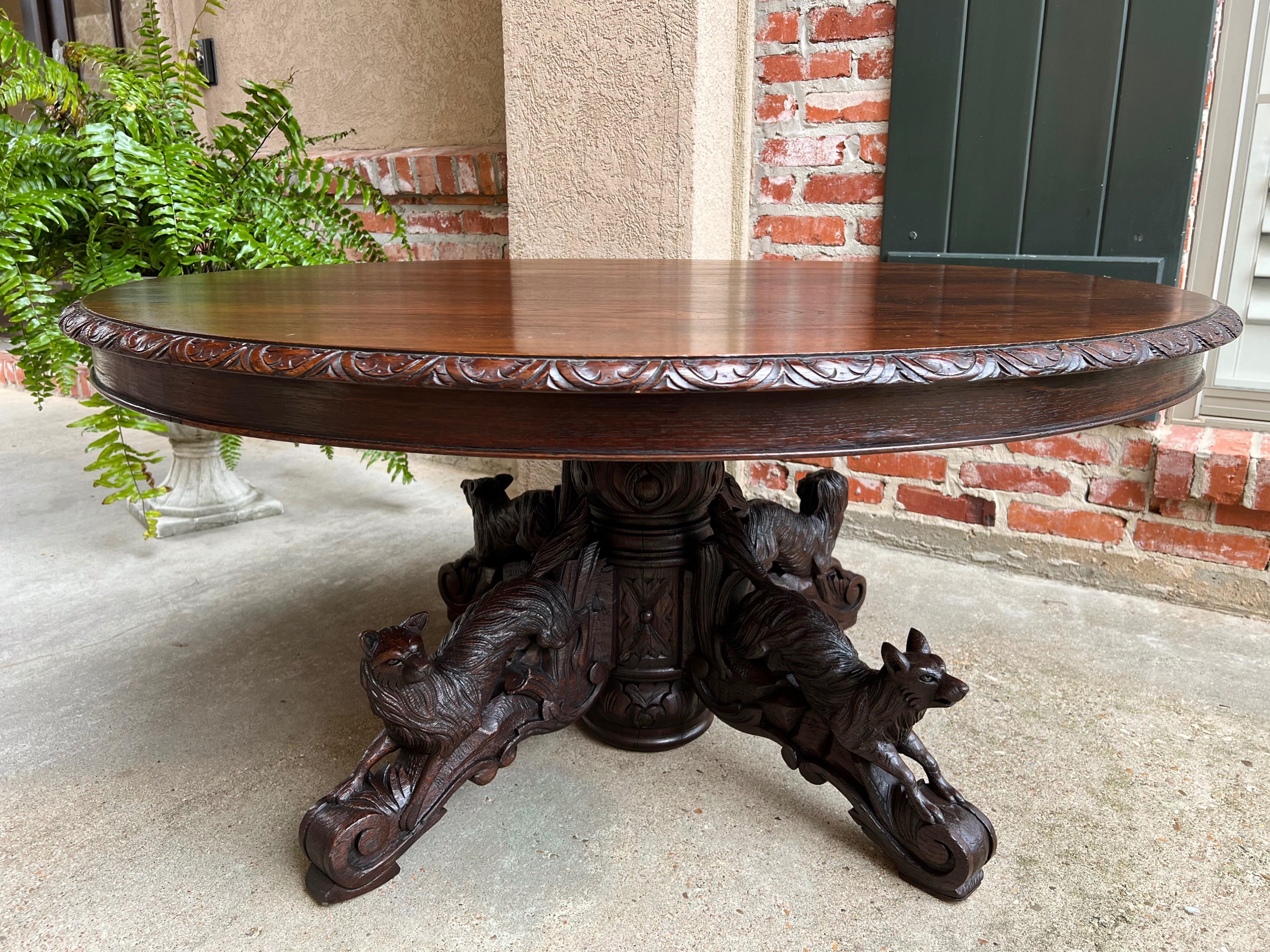 Antique French Carved Oak Hunt Oval Coffee Sofa Table Black Forest Lodge Boar/Fox/Hound.

Direct from France, a majestic and substantial antique French “hunt” oval coffee table. Stunning hand carved details; one glance reveals the superior quality