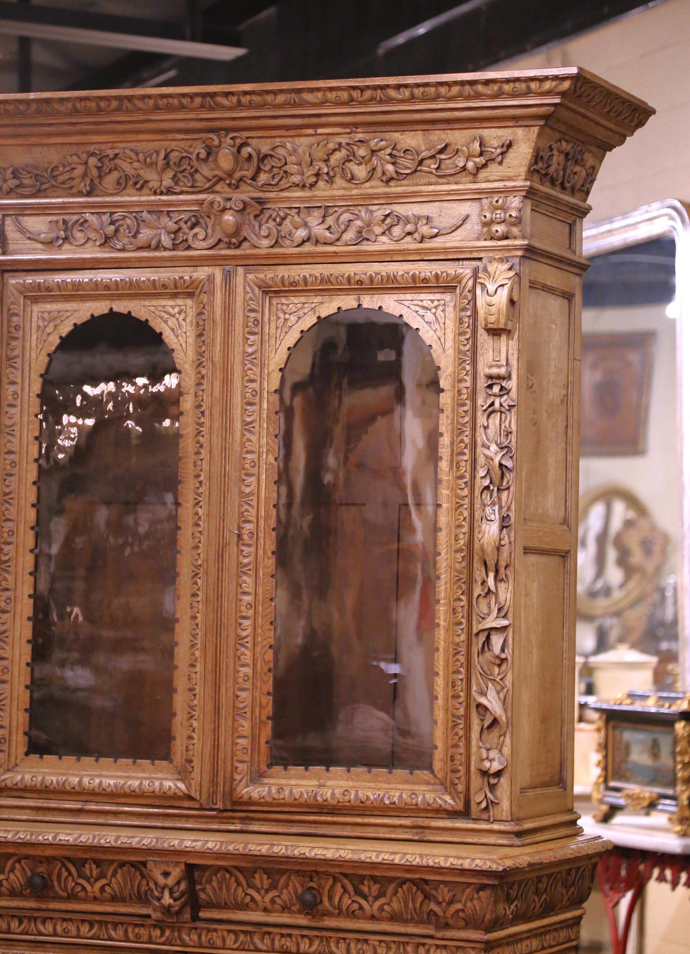 Glass 19th Century French Carved Oak Nine-Gun Cabinet with Bird and hunt Motifs For Sale