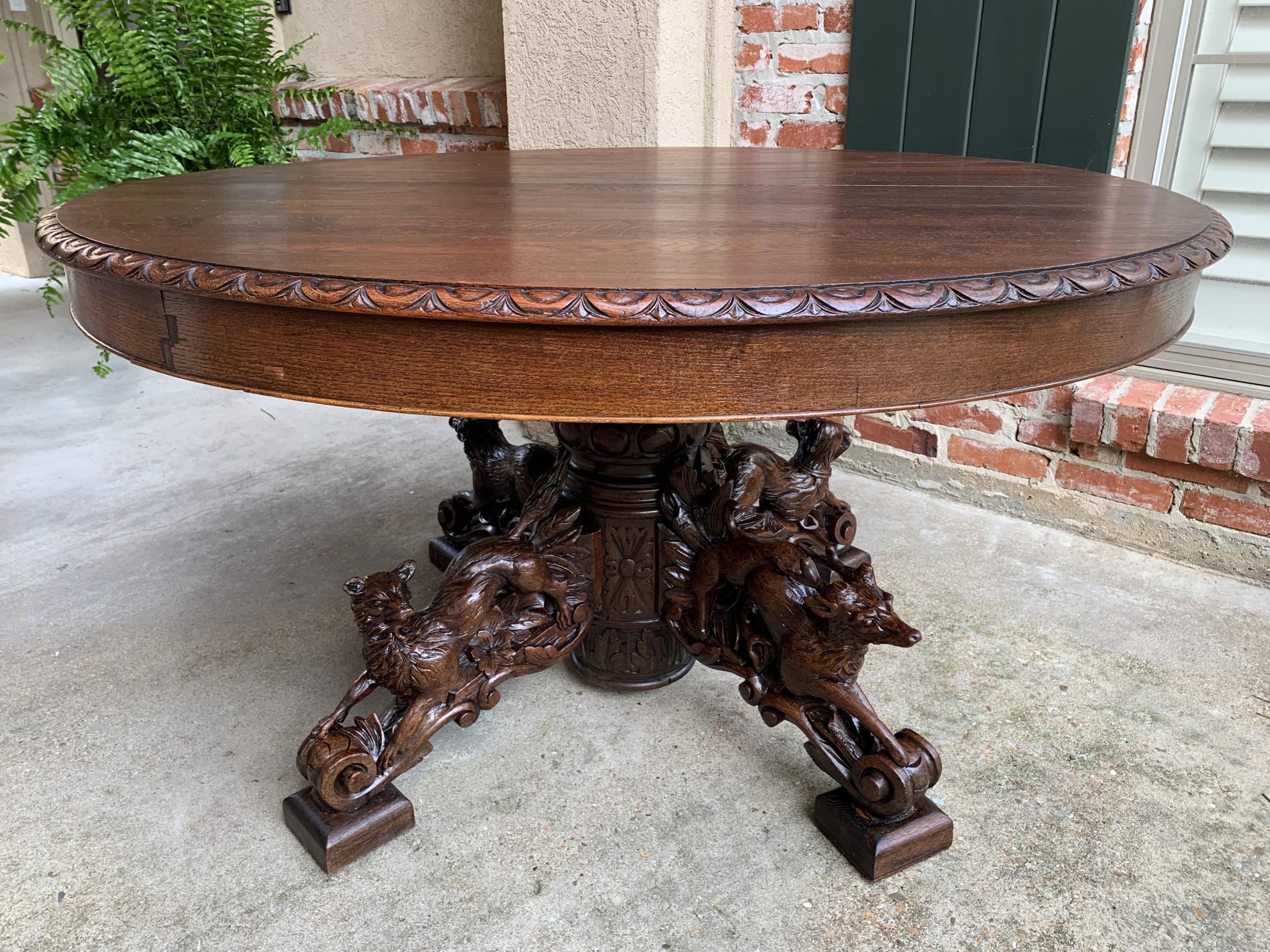 19th century French carved oak oval dining Hunt table Black Forest animal lodge

~Direct from France~
~Majestic and substantial antique French “hunt” oval dining table~
~Stunning hand carved details; one glance reveals the superior quality of