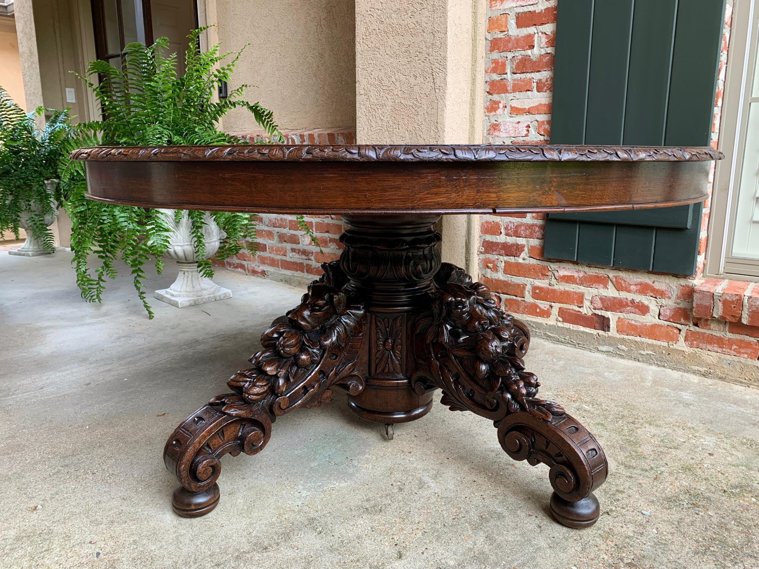 19th century French carved oak oval dining hunt table Black Forest dog hound

~Direct from France~
~Gorgeous antique French “hunt” oval dining table~
~Stunning hand carved details; one glance reveals the superior quality of the massive carvings