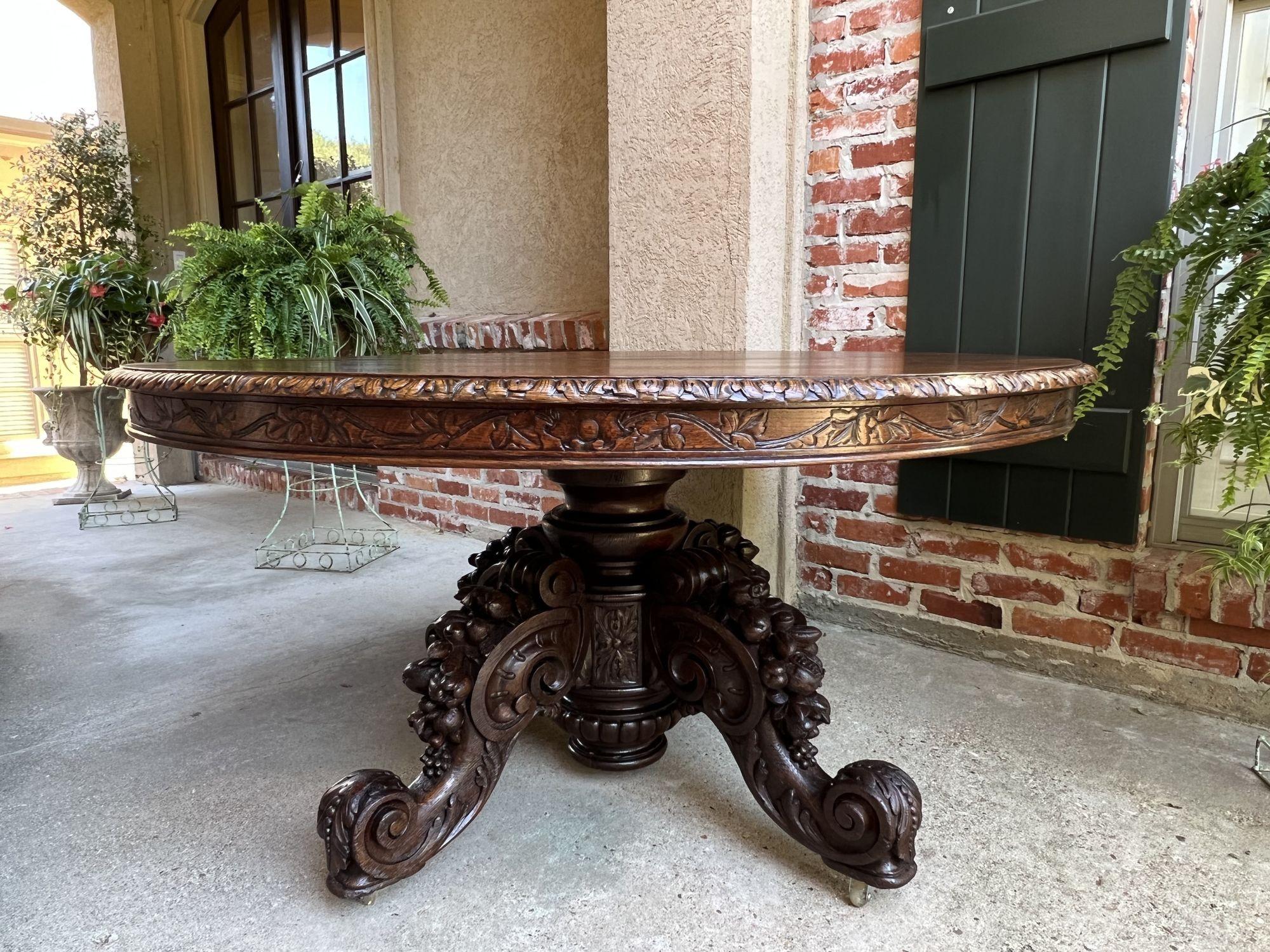 Hand-Carved 19th Century French Carved Oak Oval Dining Table Black Forest Game Library Table