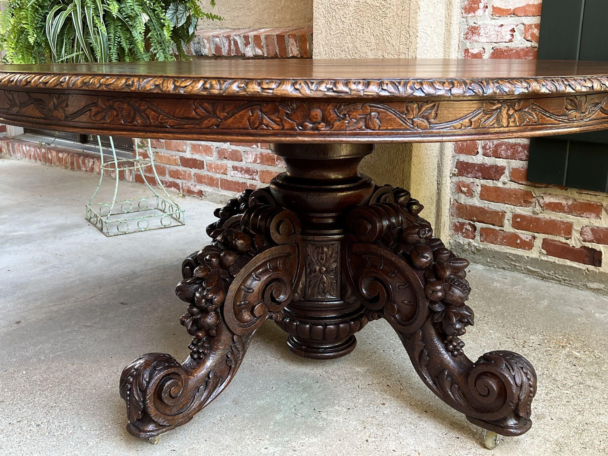 Late 19th Century 19th Century French Carved Oak Oval Dining Table Black Forest Game Library Table