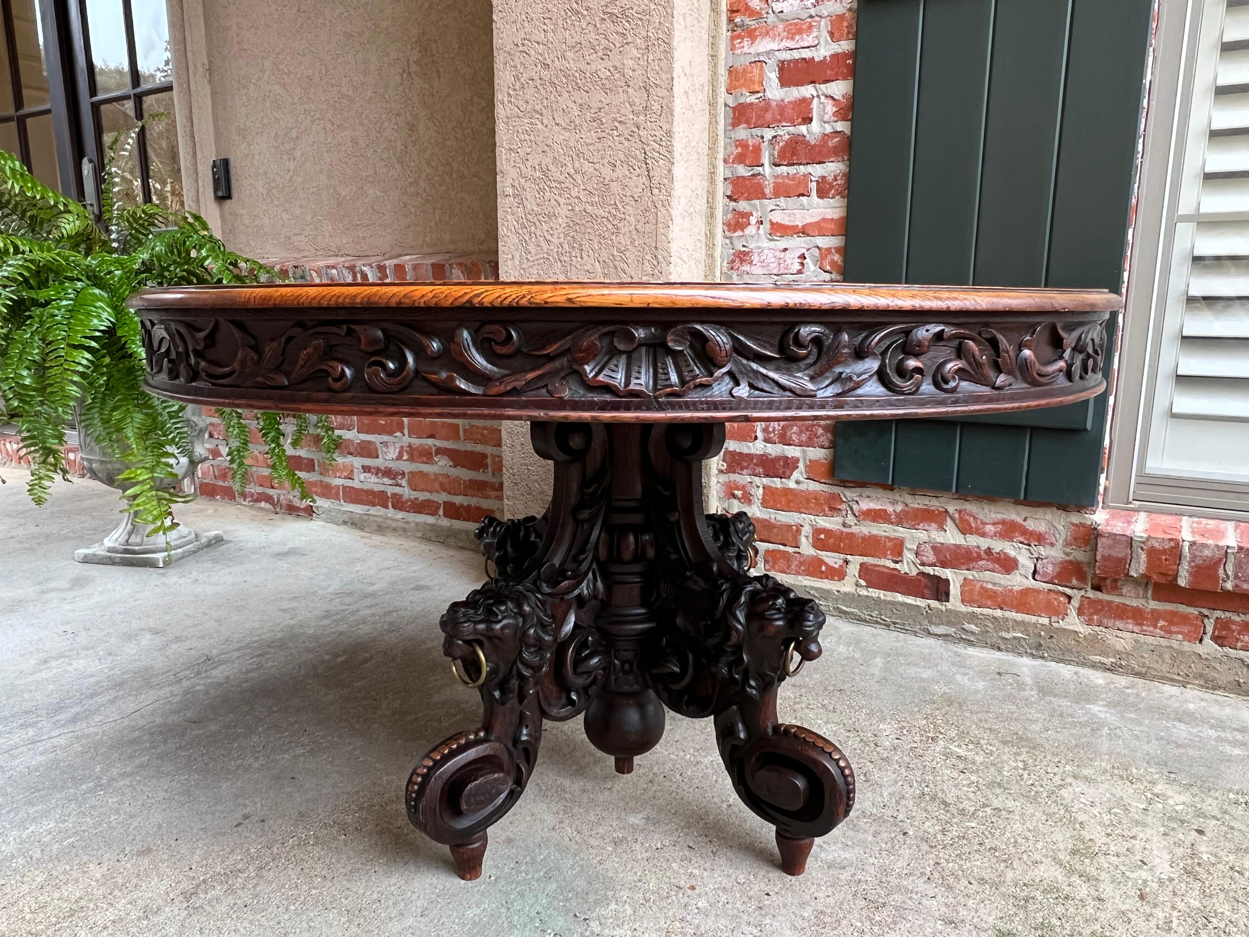 Antique French Carved Oak Oval Sofa Dining Table Lion Louis XIV Renaissance Style.

Direct from France, a gorgeous antique French carved oak oval sofa or dining table, circa 1880.
The base is a carving masterpiece, with four large, dimensional