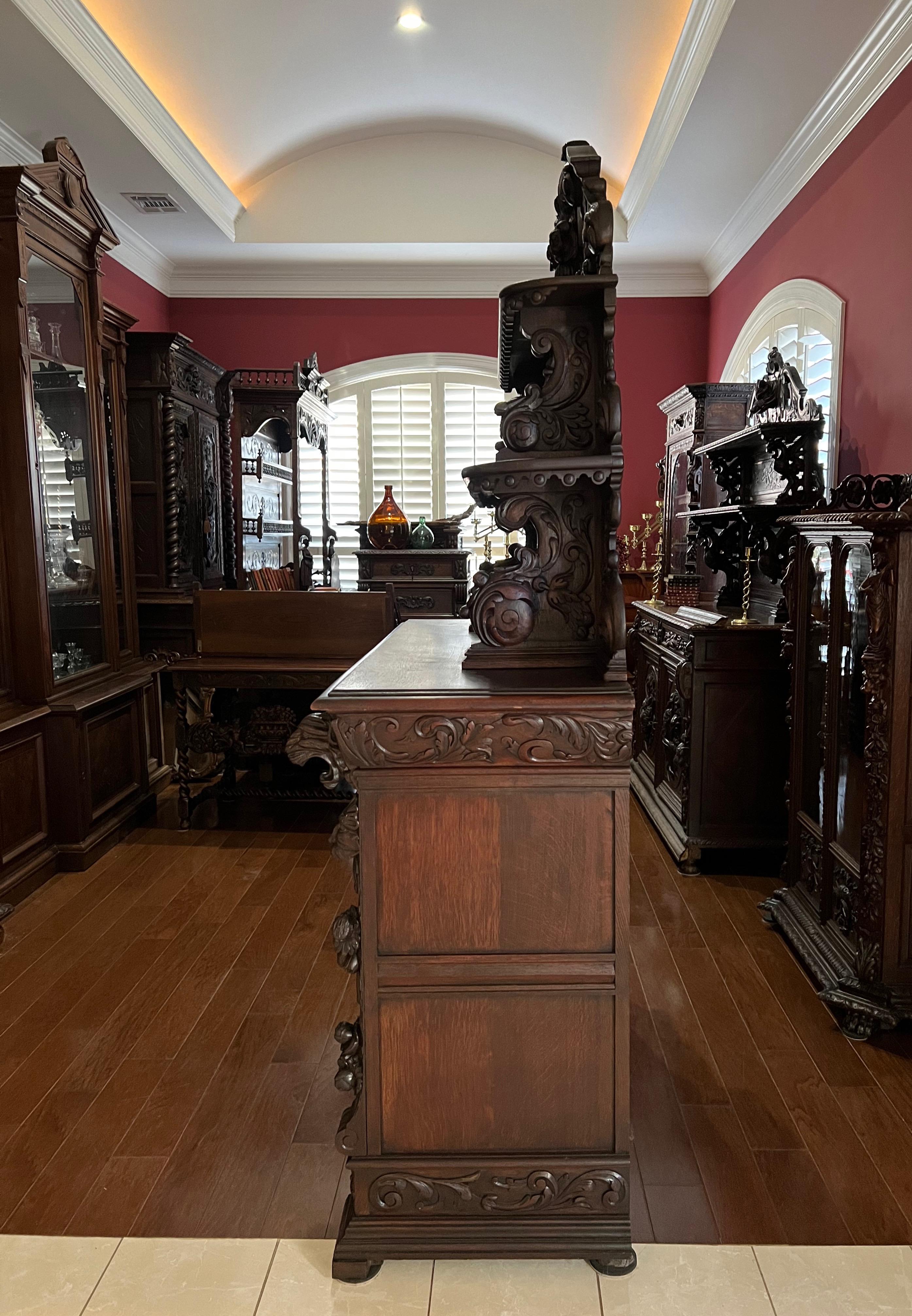 Highly carved with Black Forest style dimensional carvings. 