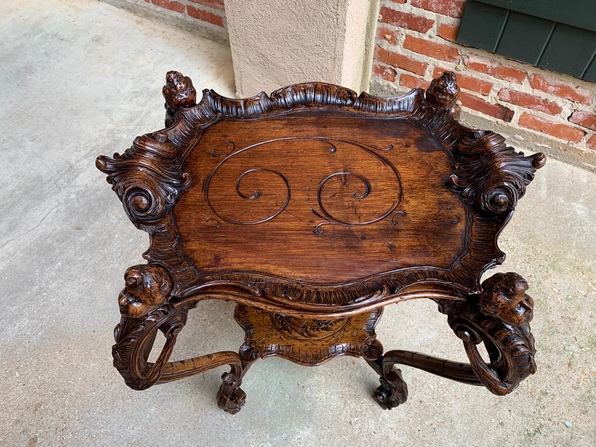 19th century French carved oak sofa dessert table serving tray Louis XV Cherub

~Direct from France~
~Gorgeous 19th century French dessert table with it’s original serving tray!~
~Opulent hand carvings include dimensional cherubs to the corners with