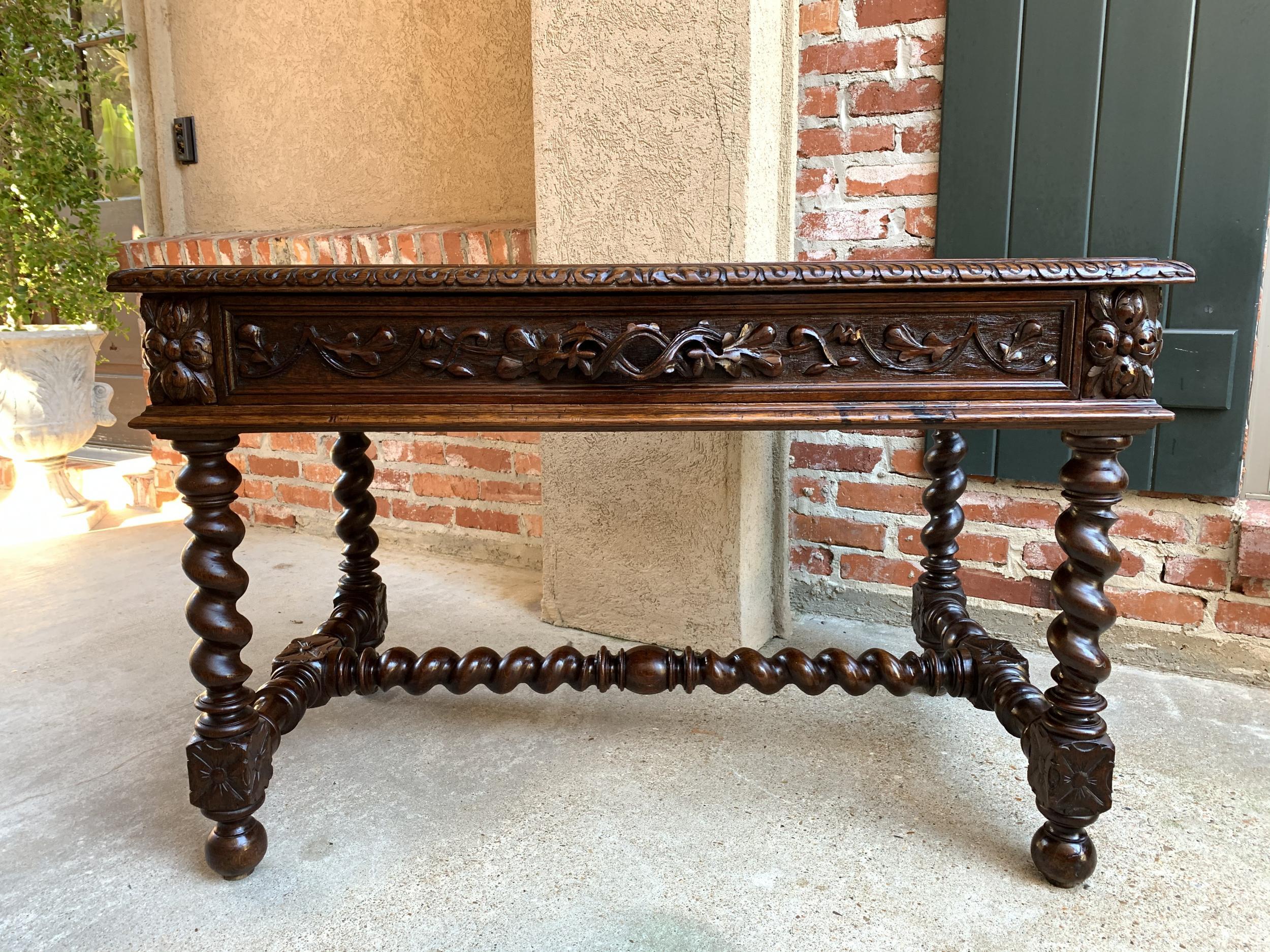 19th century French carved oak sofa table writing desk barley twist Black Forest

~Direct from France~
~Beautiful French writing desk or sofa table with elegant features!~
~Lovely barely twist legs as well as barley twist stretcher and cross