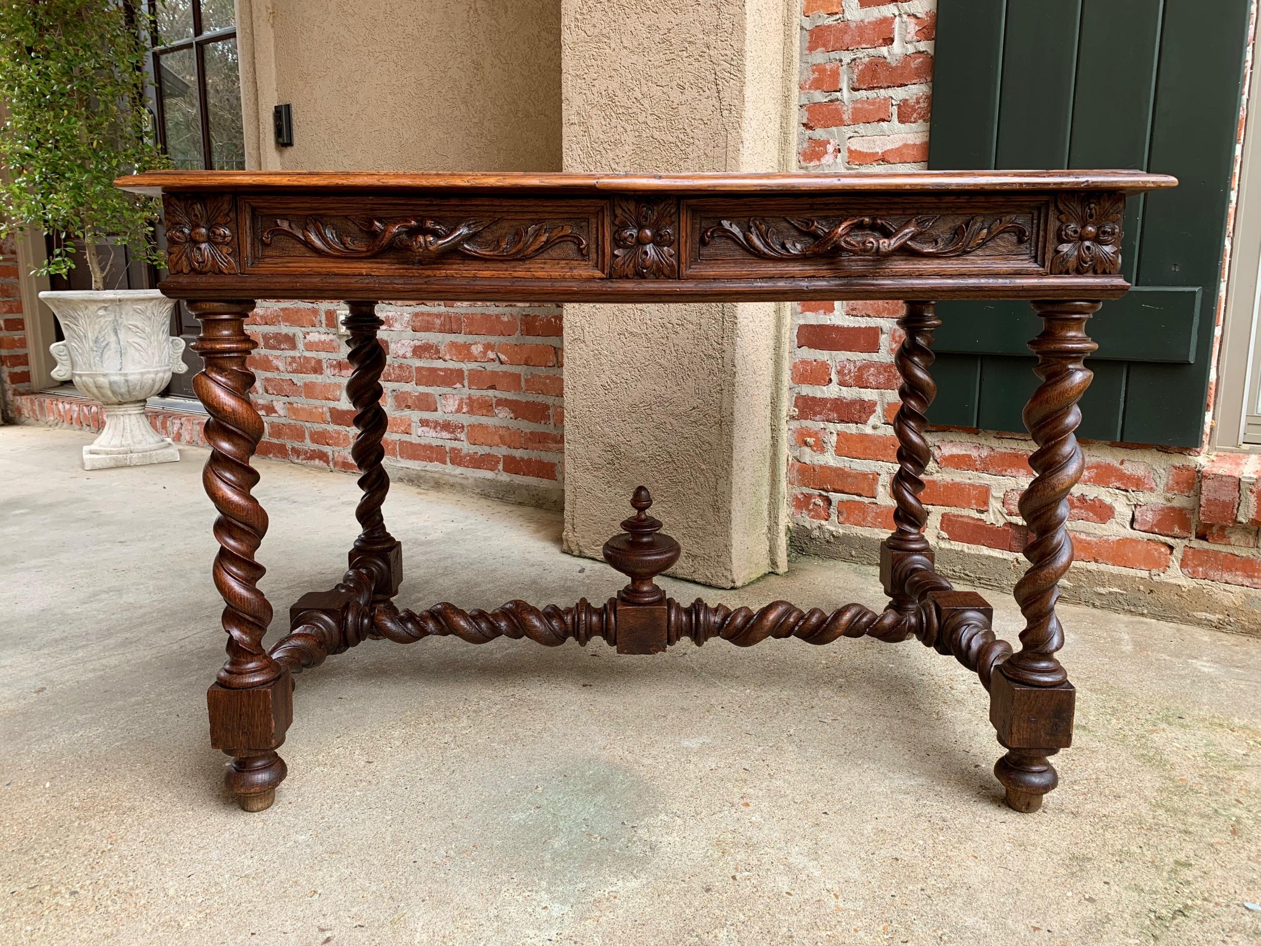 19th century French carved oak sofa table writing desk barley twist black forest

~Direct from France~
~Beautiful French writing desk or sofa table with elegant features~
~Front frieze features two large drawers with Black Forest style open
