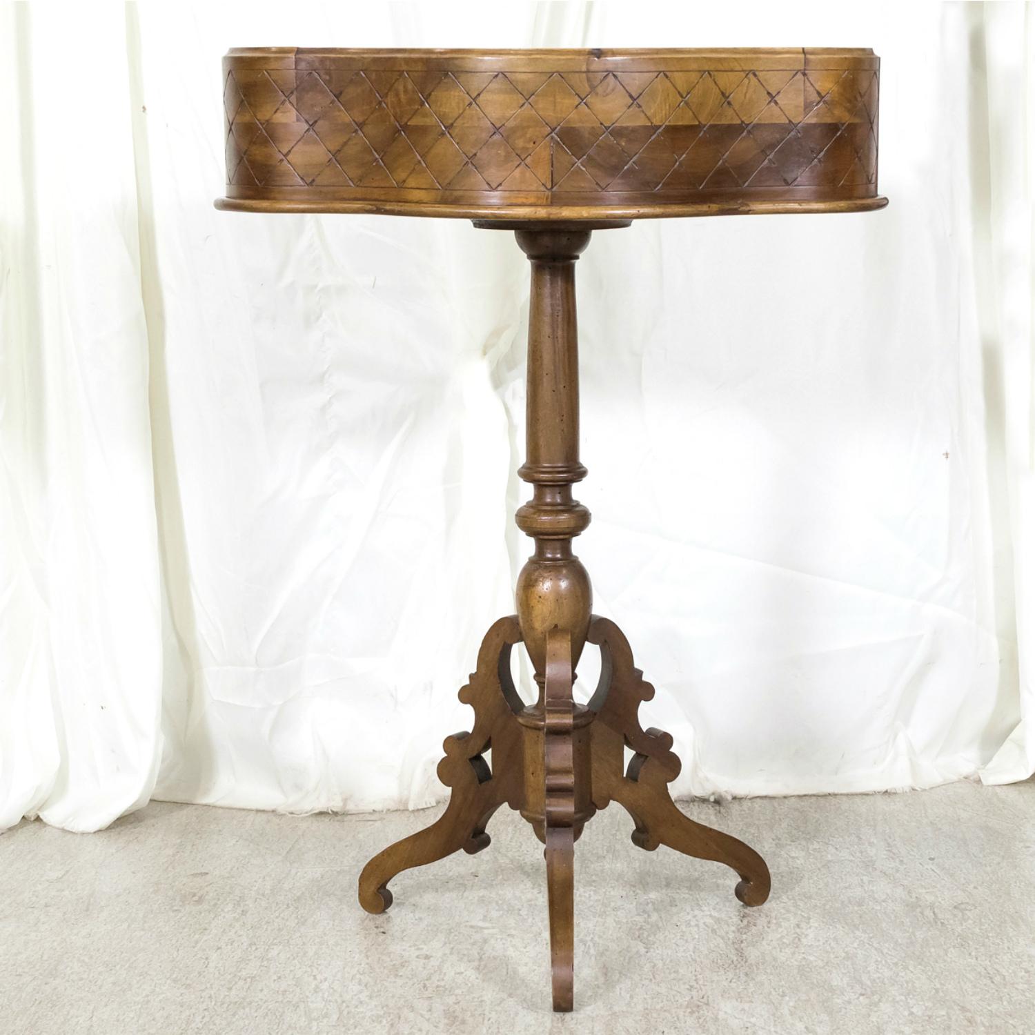 Hand-Carved 19th Century French Carved Oval Shaped Walnut Jardinière Planter on Tripod Stand For Sale