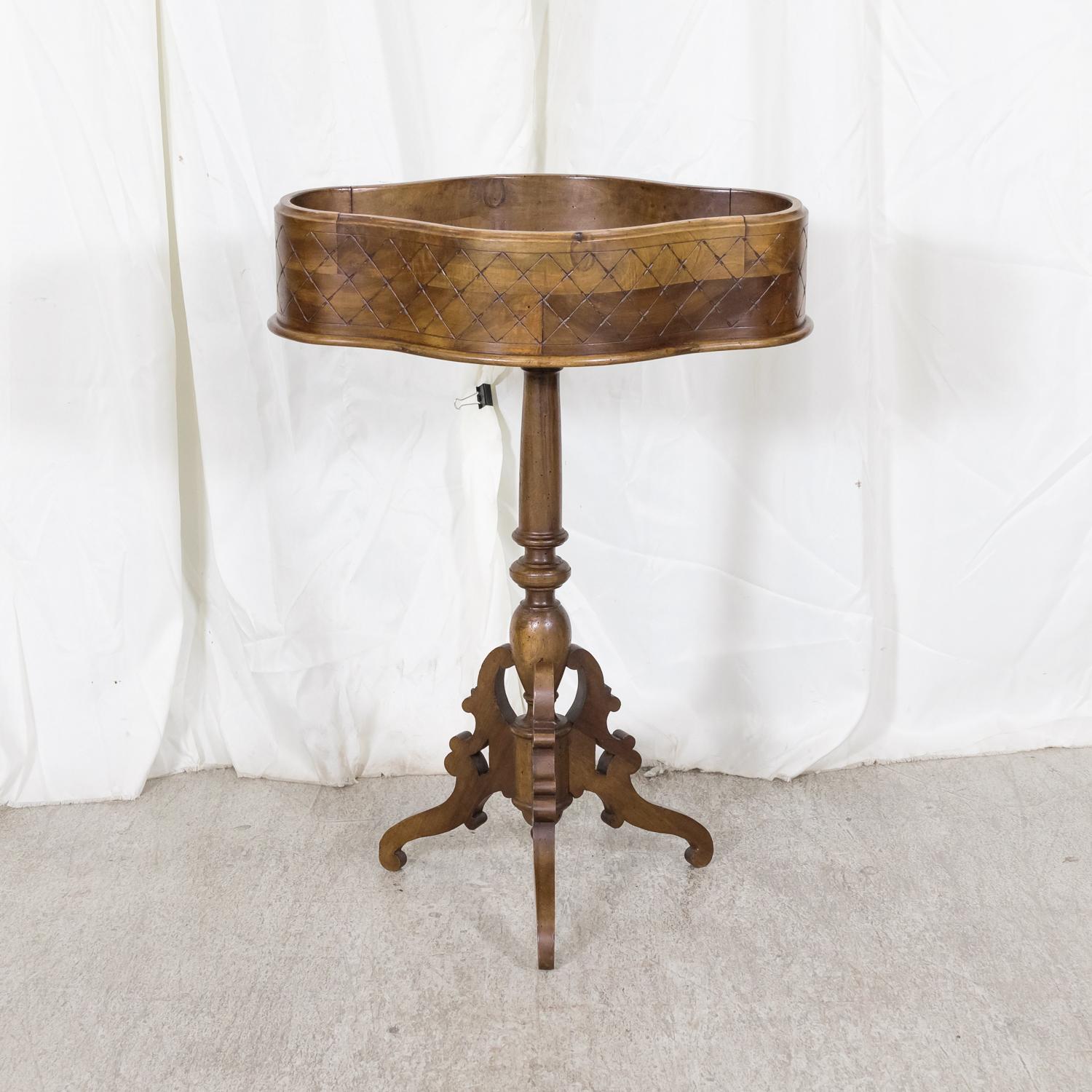 Late 19th Century 19th Century French Carved Oval Shaped Walnut Jardinière Planter on Tripod Stand For Sale