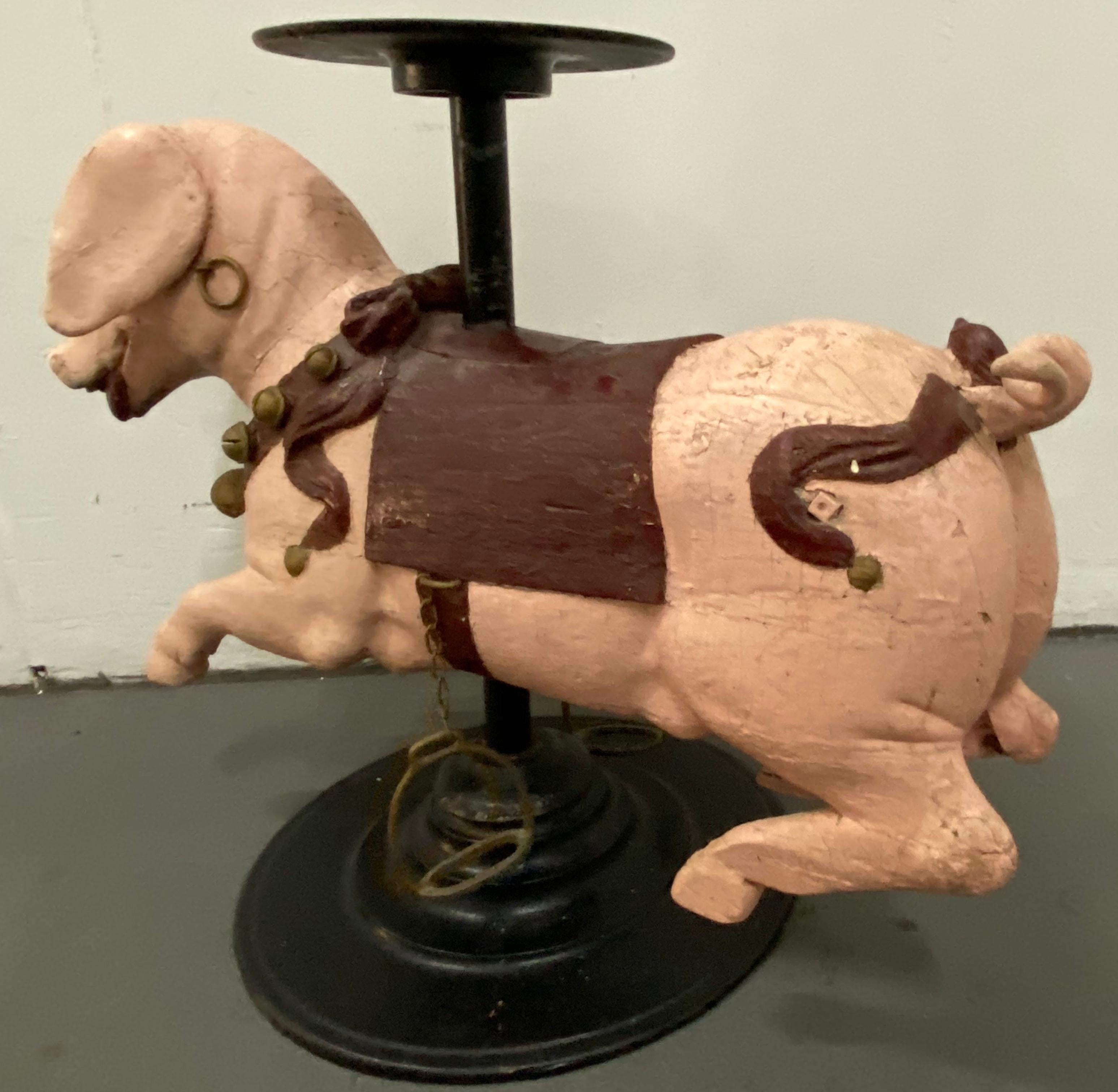 19th century French carved and painted Carousel pig on stand

Large hand carved and painted antique French carousel pig

The pig may have been repainted over the years

The stand is included for display purposes

Pig dimensions 36